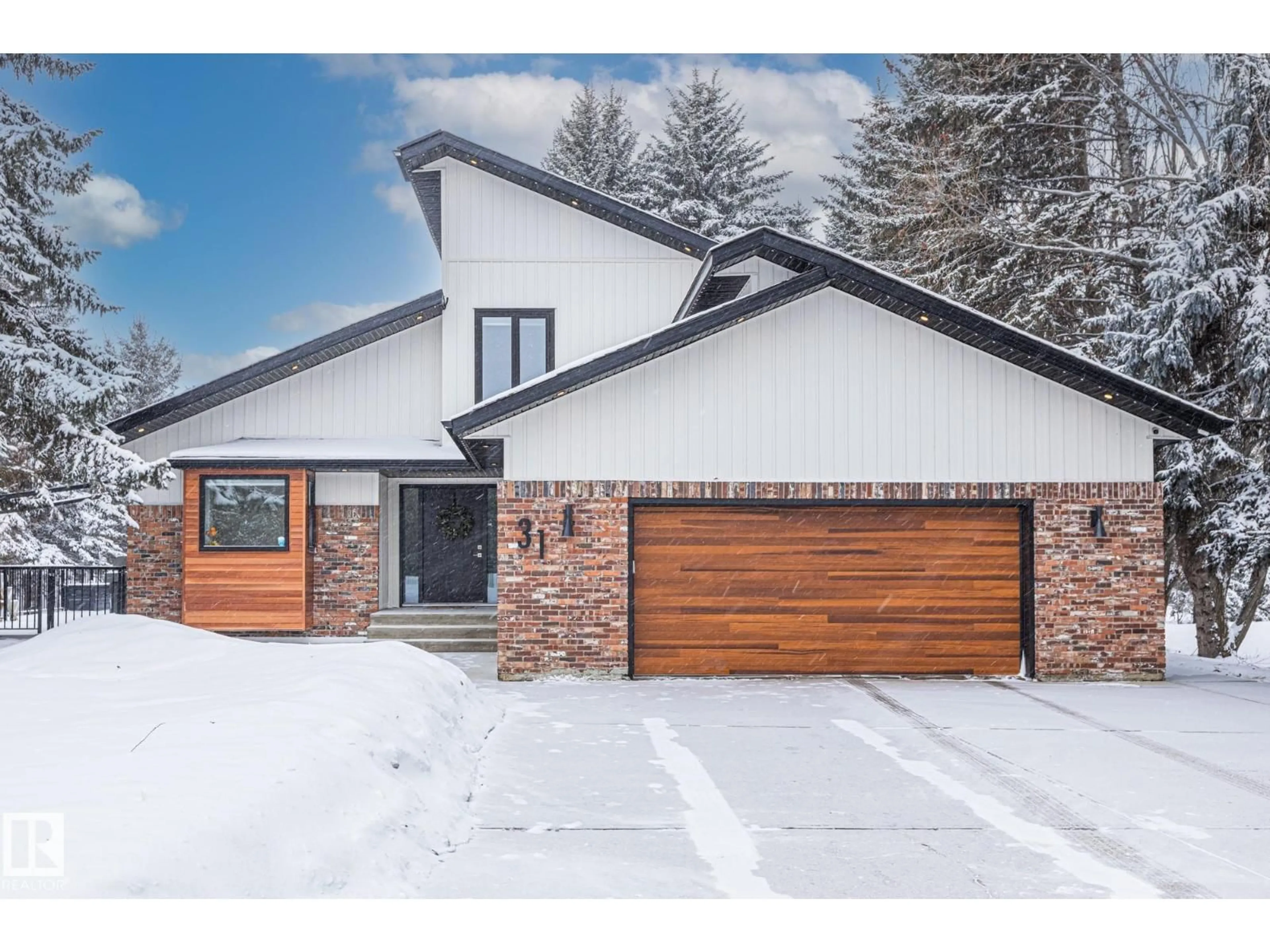 Home with brick exterior material, street for 31 - 54324 BELLEROSE DR, Rural Sturgeon County Alberta T8T0C5