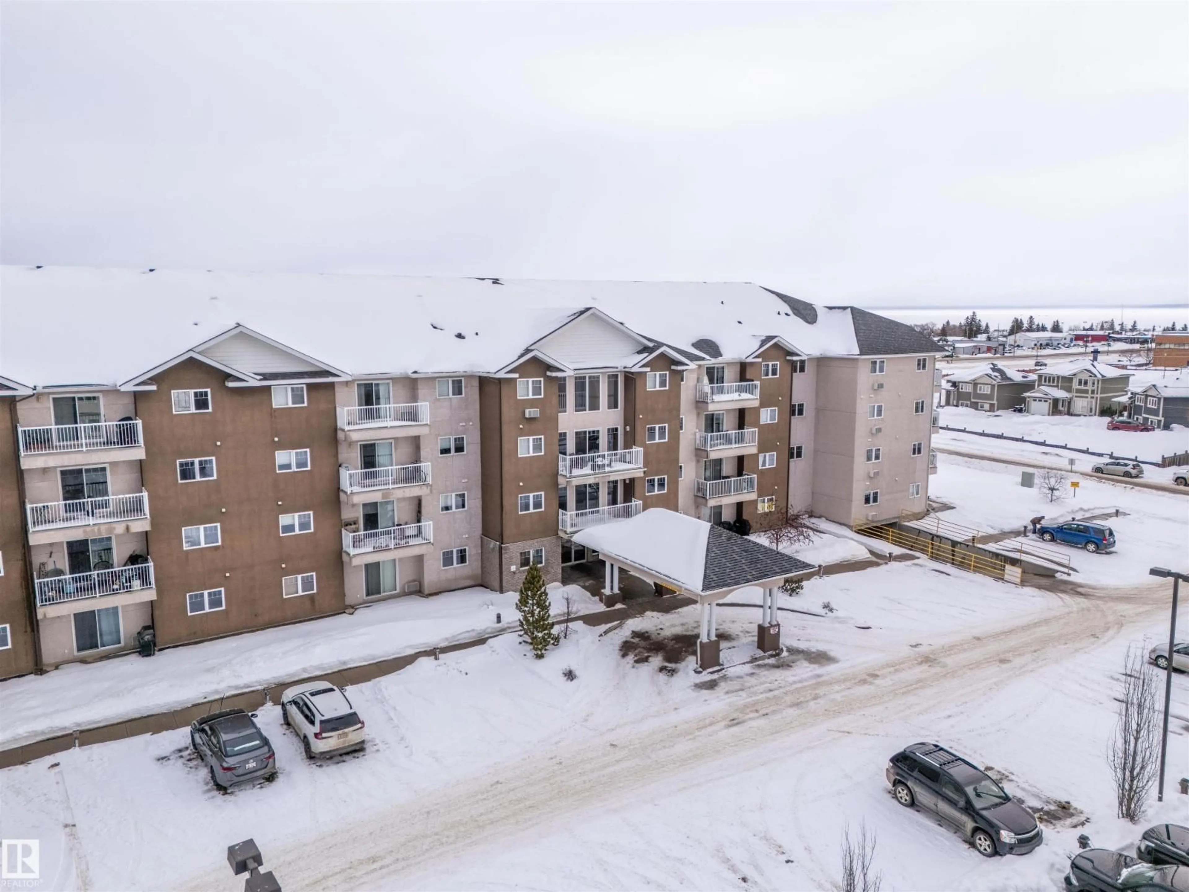 A pic from outside/outdoor area/front of a property/back of a property/a pic from drone, building for 3105-901 16 ST, Cold Lake Alberta T9M0C3