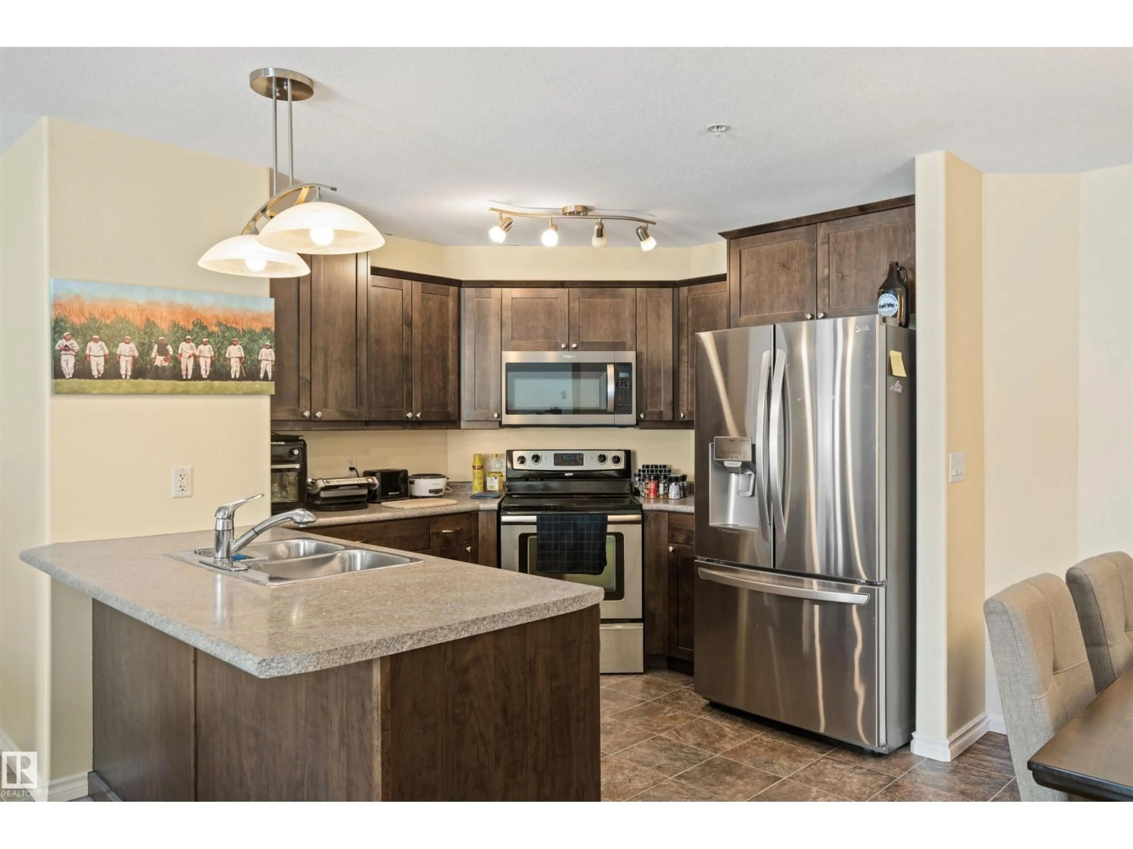 Open concept kitchen, ceramic/tile floor for 3105-901 16 ST, Cold Lake Alberta T9M0C3