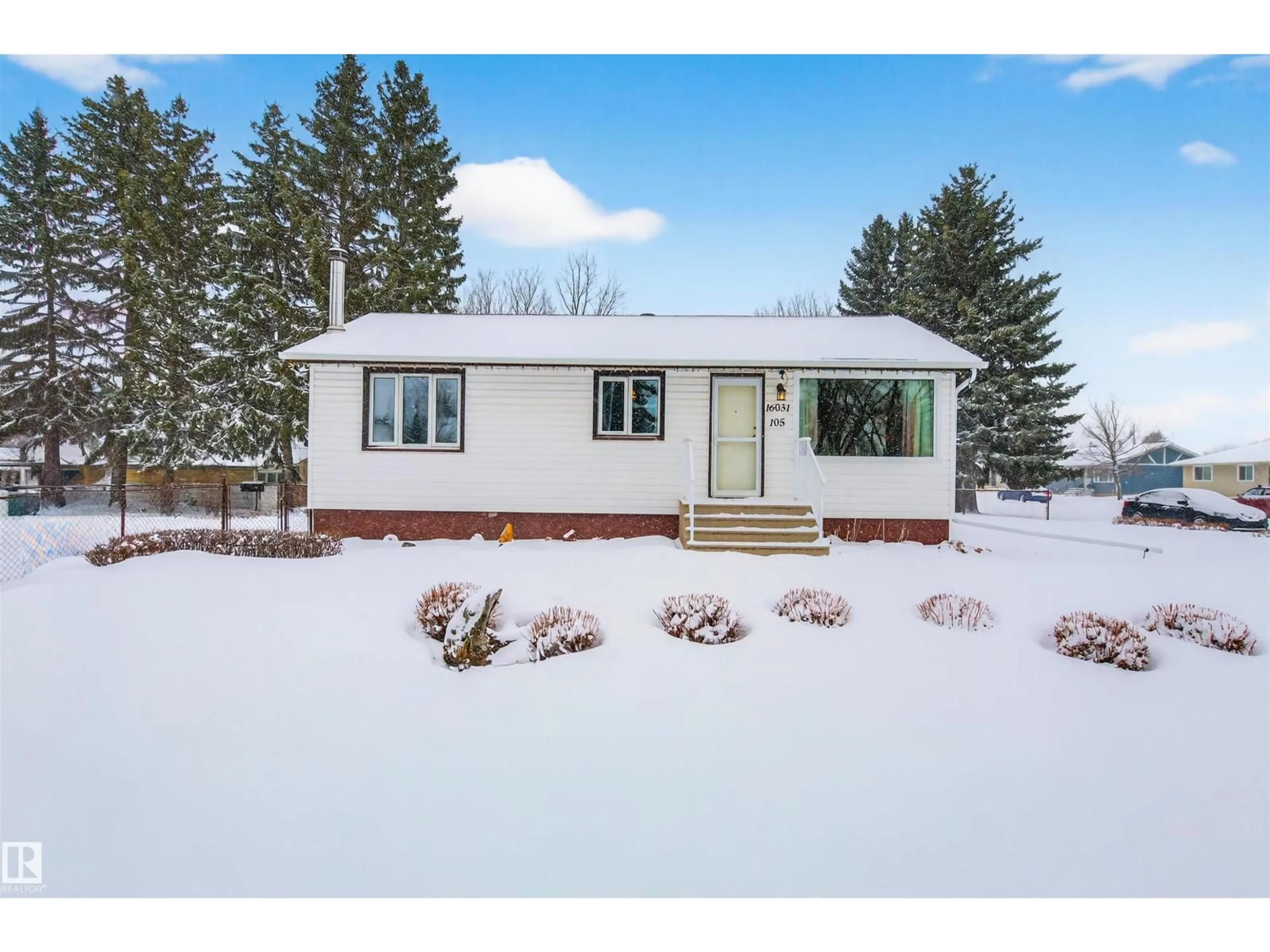 Home with vinyl exterior material, street for 16031 105 AV, Edmonton Alberta T5P0T8