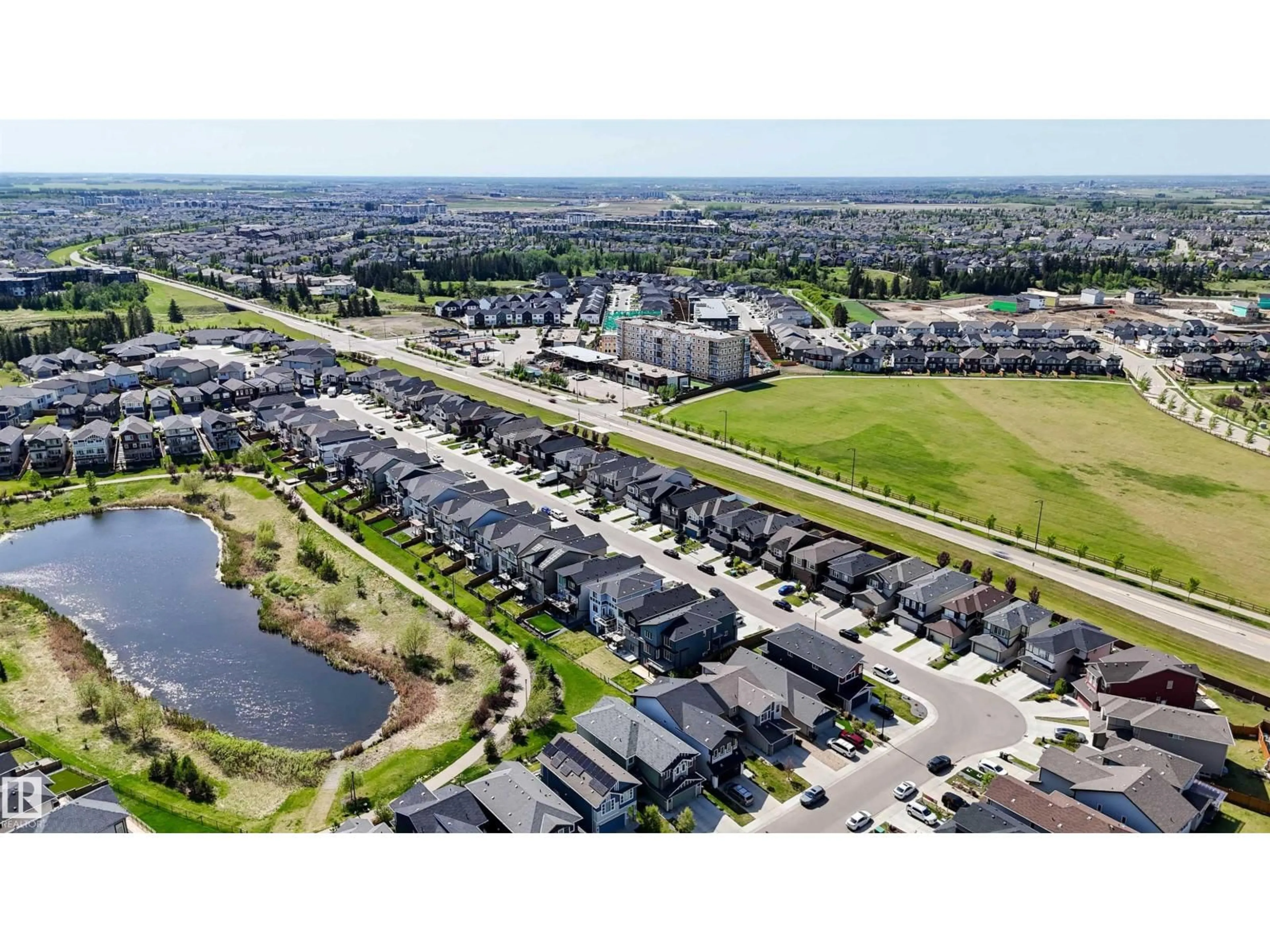 A pic from outside/outdoor area/front of a property/back of a property/a pic from drone, water/lake/river/ocean view for SW - 2743 COLLINS CR, Edmonton Alberta T6W3X4