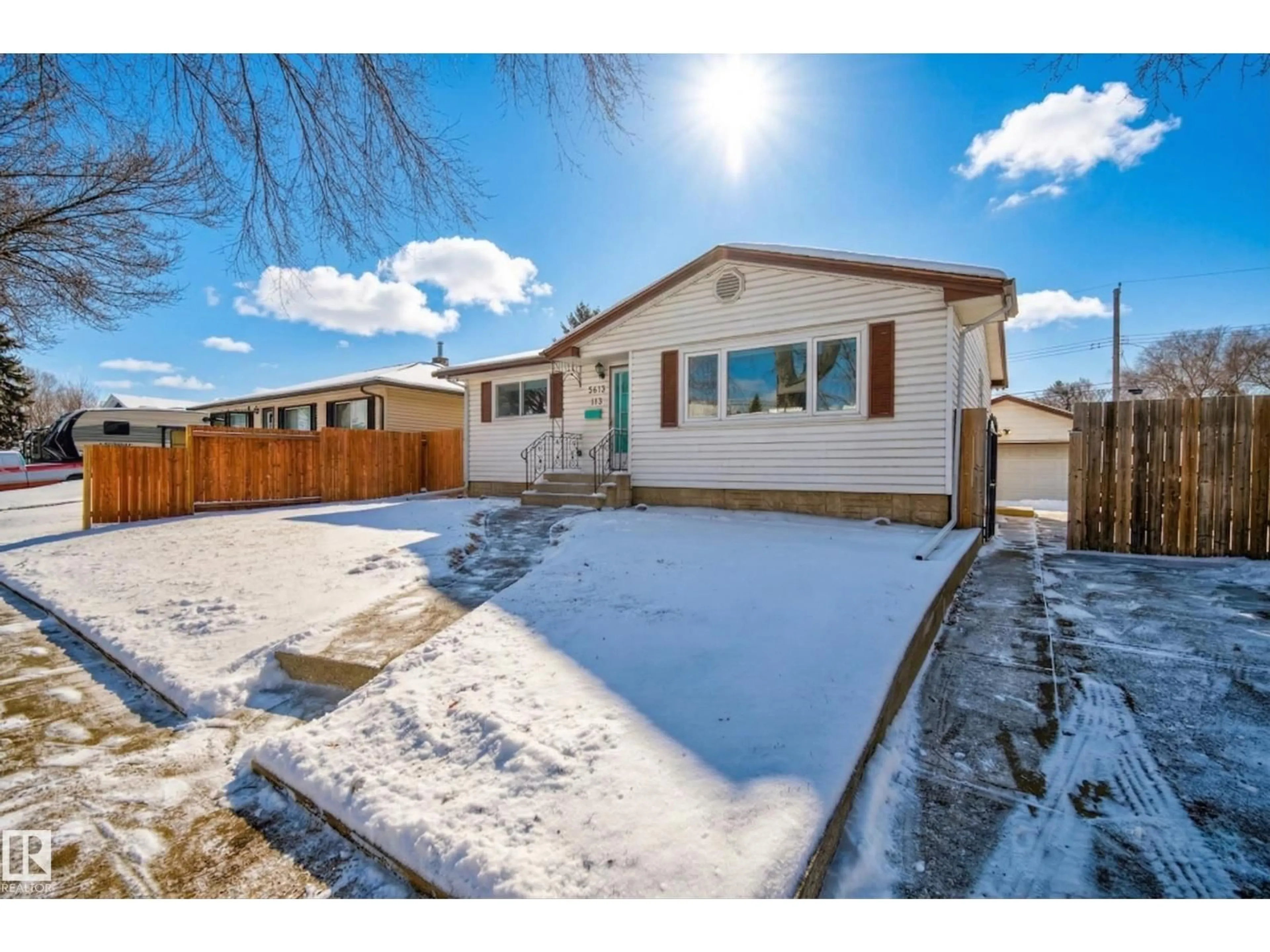 A pic from outside/outdoor area/front of a property/back of a property/a pic from drone, street for 3613 113 AV, Edmonton Alberta T5W0P7