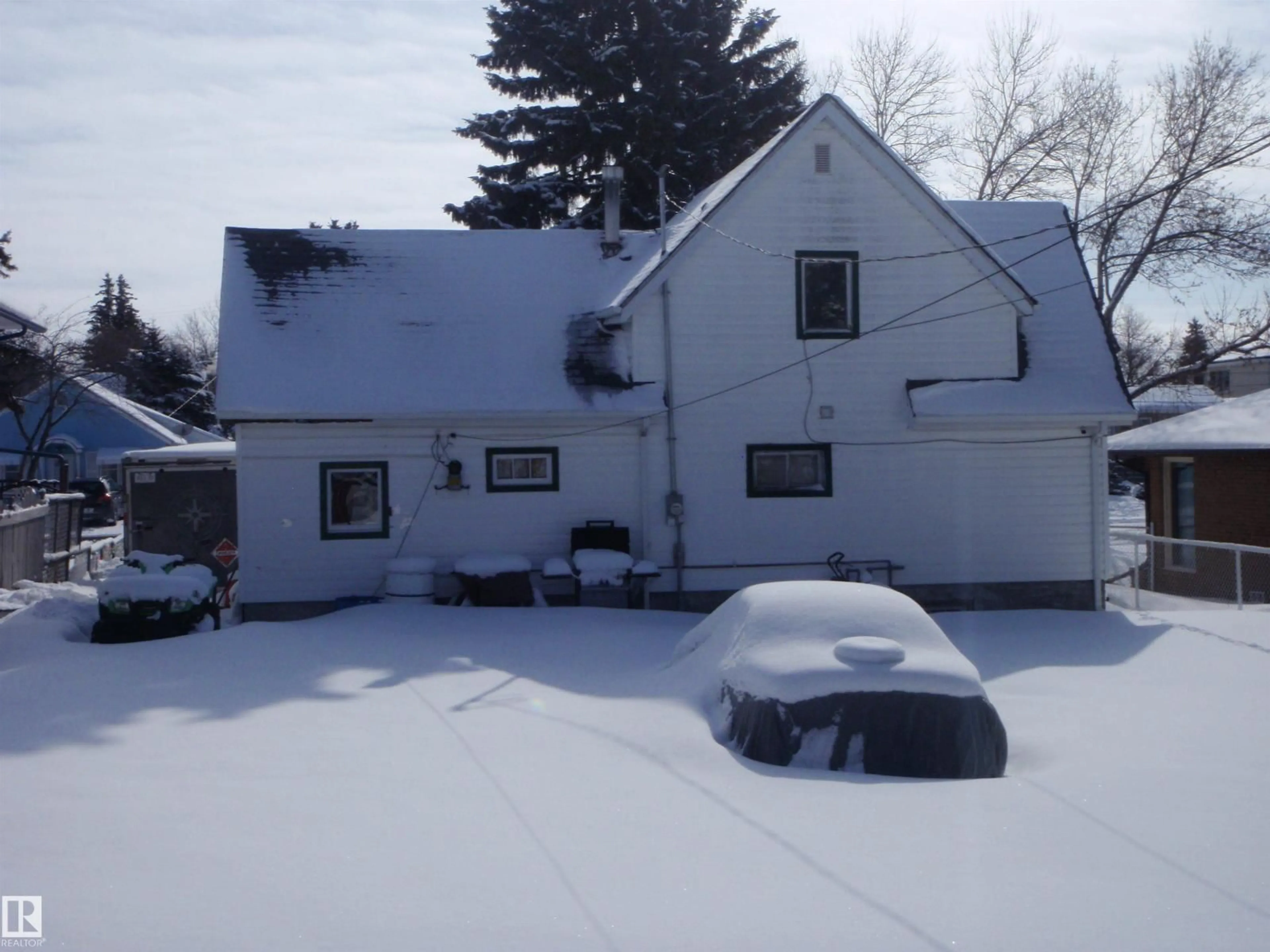 A pic from outside/outdoor area/front of a property/back of a property/a pic from drone, street for 5118 53 ST, Barrhead Alberta T7N1E8