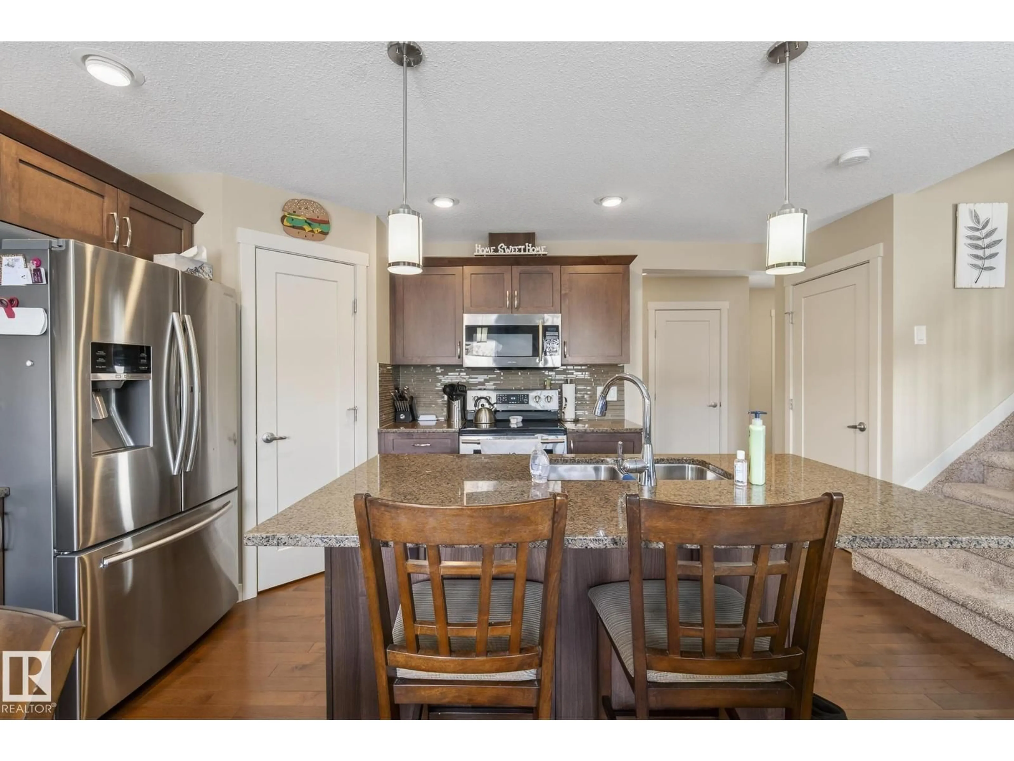 Open concept kitchen, unknown for 185 SUNTERRA WY, Sherwood Park Alberta T8H0T9