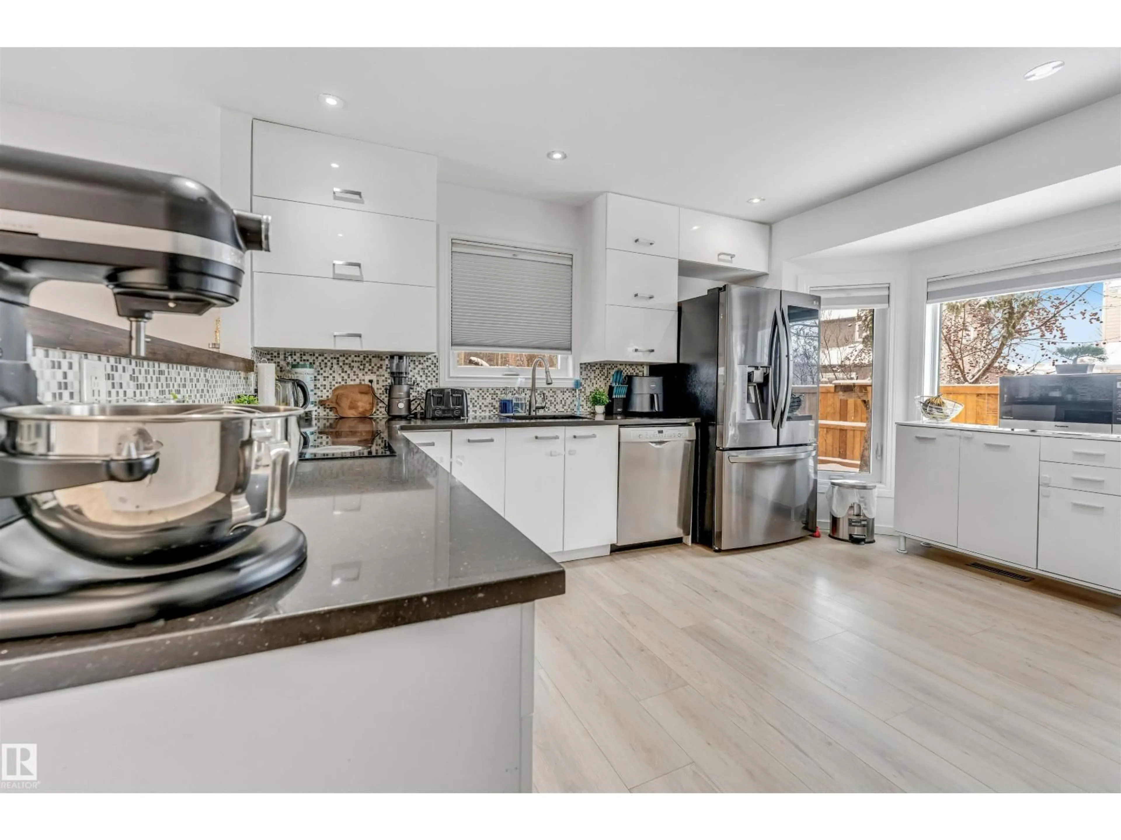 Open concept kitchen, unknown for 18403 55 AV, Edmonton Alberta T6M1Y8