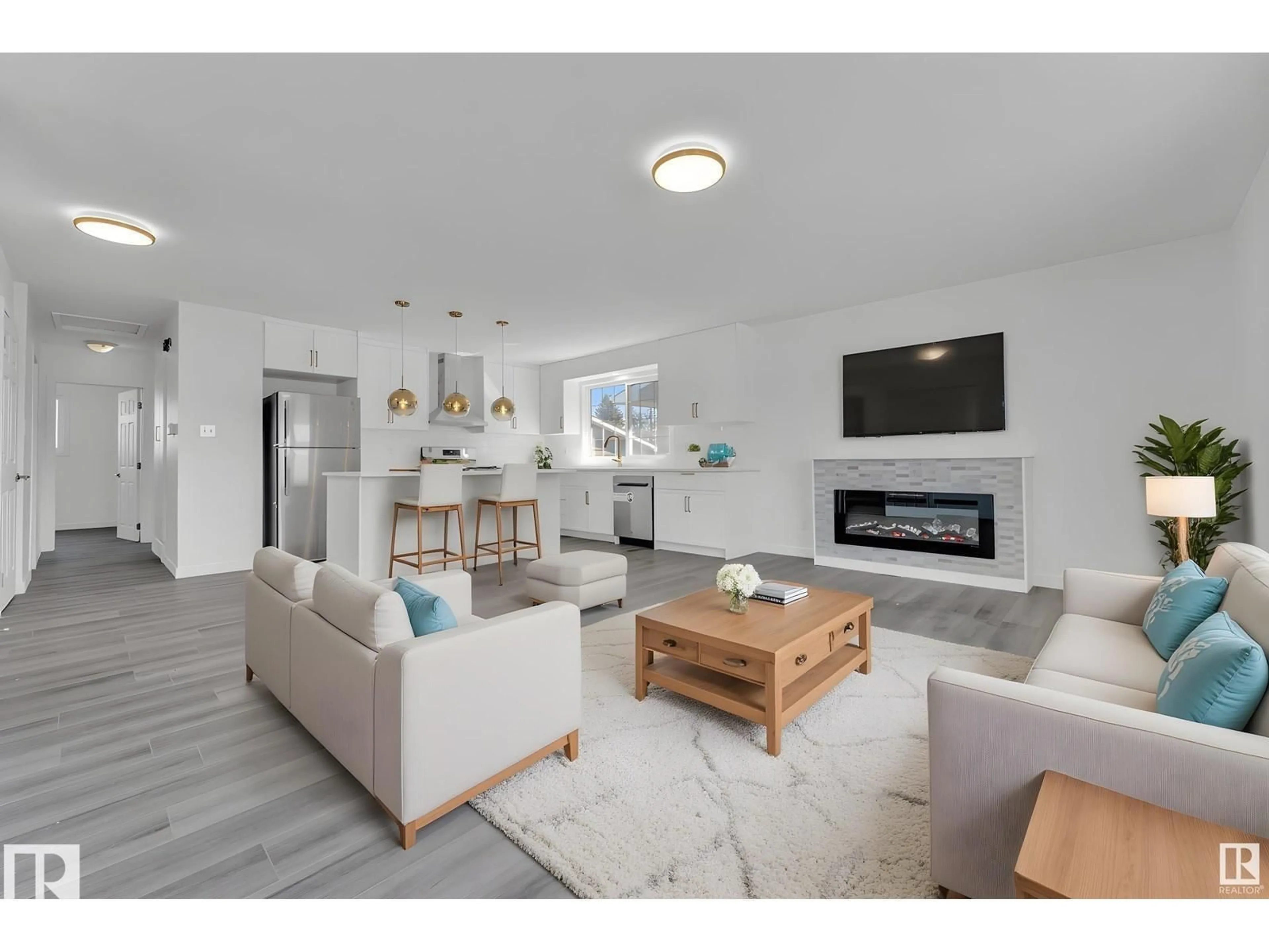 Open concept kitchen, wood/laminate floor for 8004 130 AV, Edmonton Alberta T5C1Y5