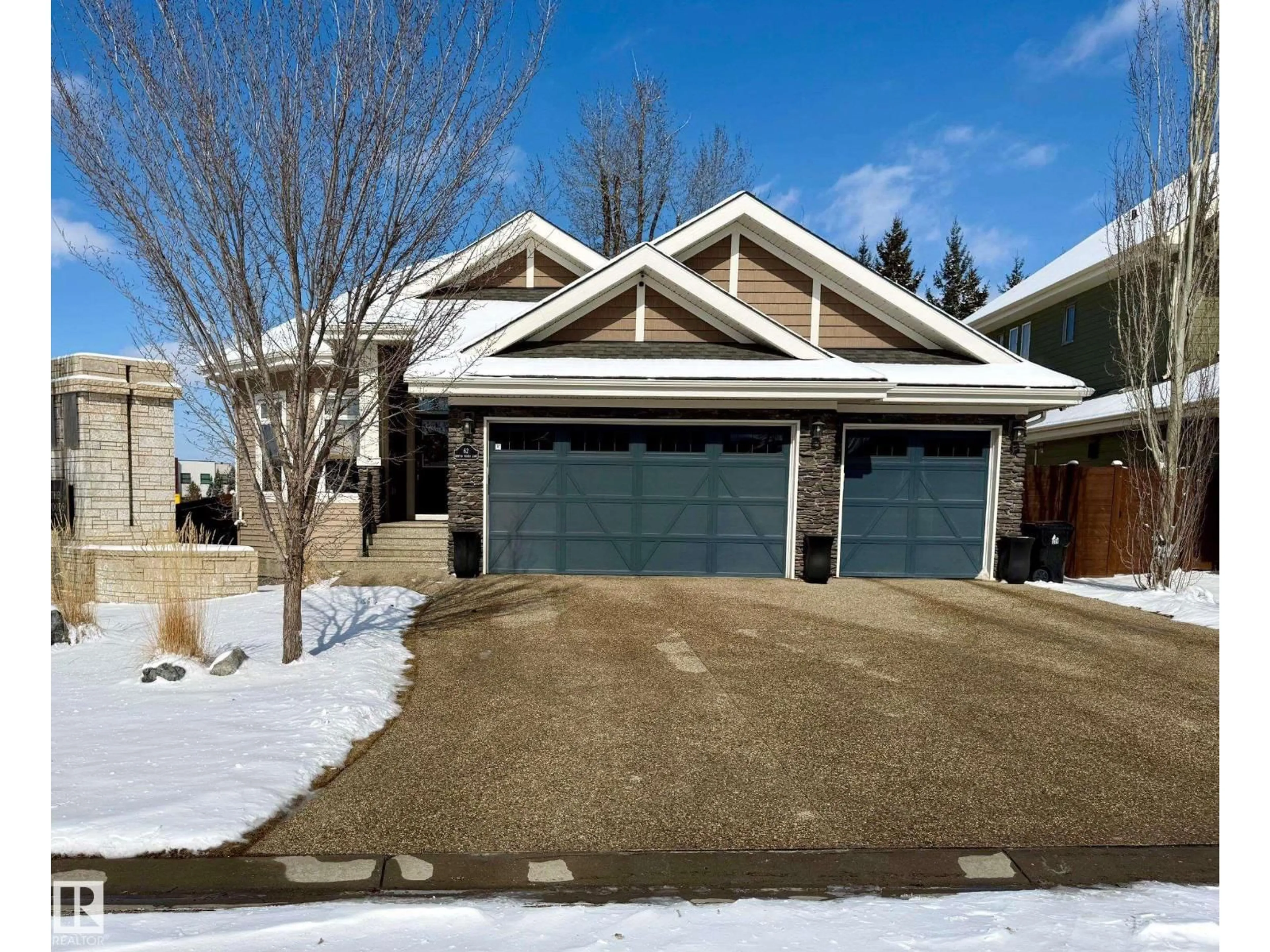 Home with vinyl exterior material, street for 62 KENTON WOODS LN, Spruce Grove Alberta T7X0P8