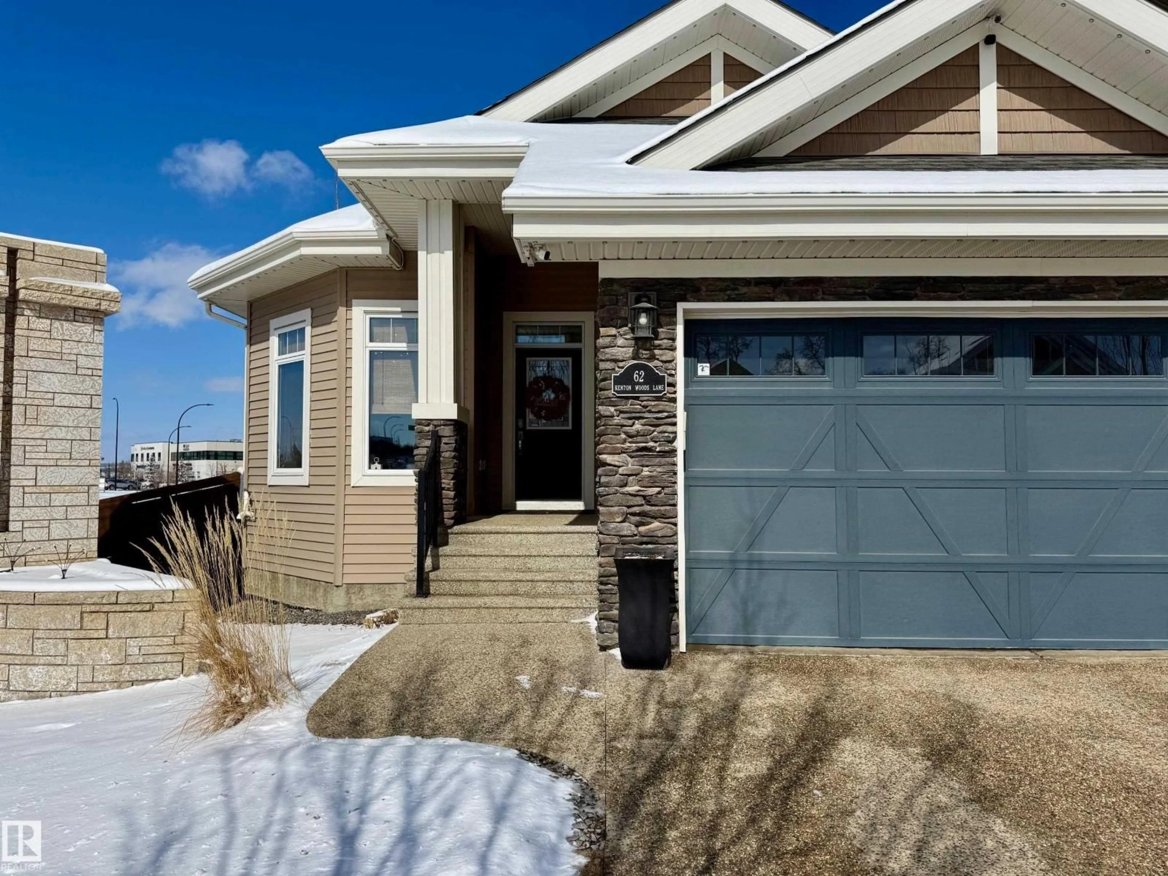 Home with vinyl exterior material, street for 62 KENTON WOODS LN, Spruce Grove Alberta T7X0P8