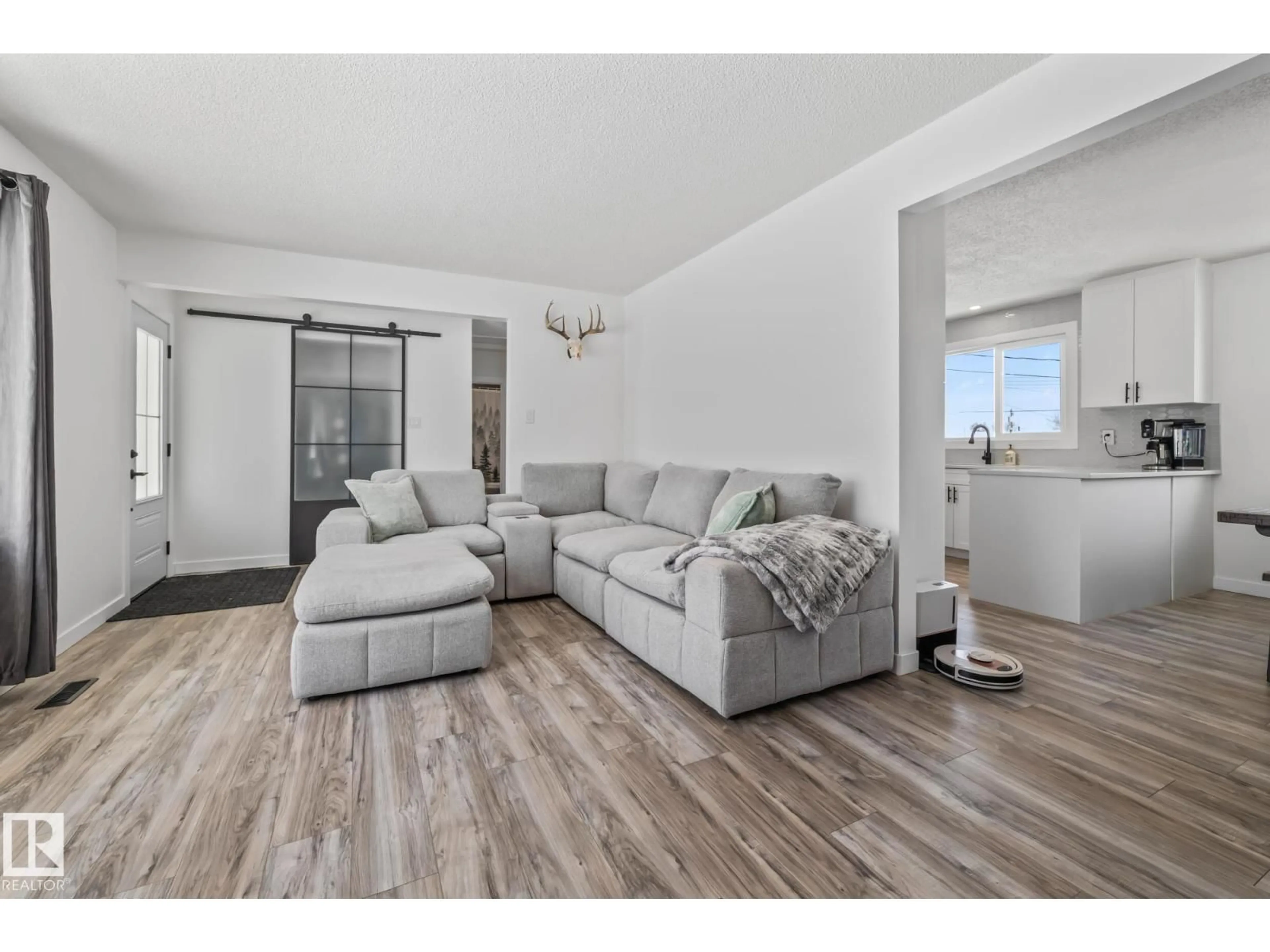 Living room with furniture, wood/laminate floor for 5016 48 AV, Lamont Alberta T0B2R0