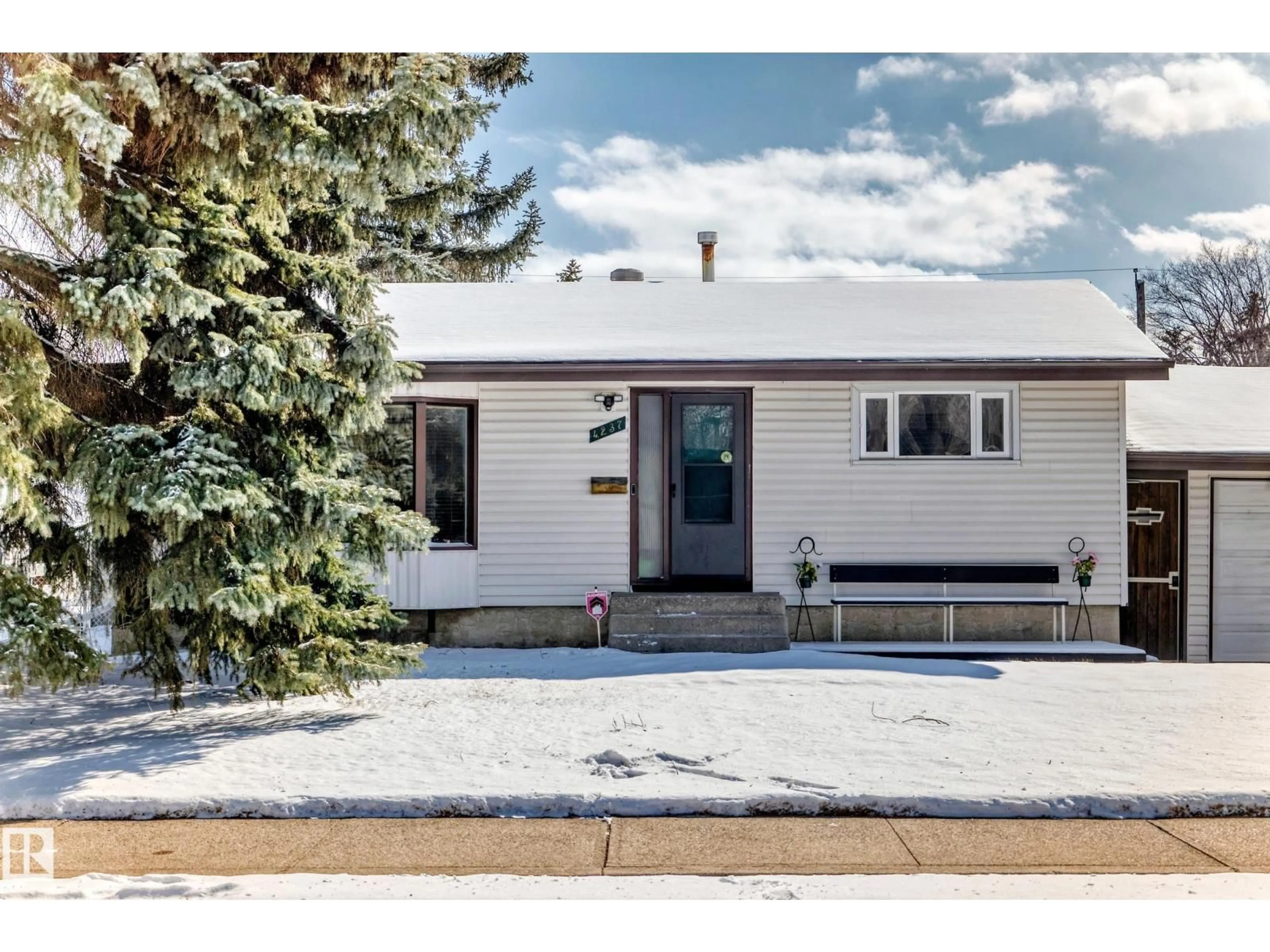 Home with vinyl exterior material, street for 4237 116 AV, Edmonton Alberta T5W0W9