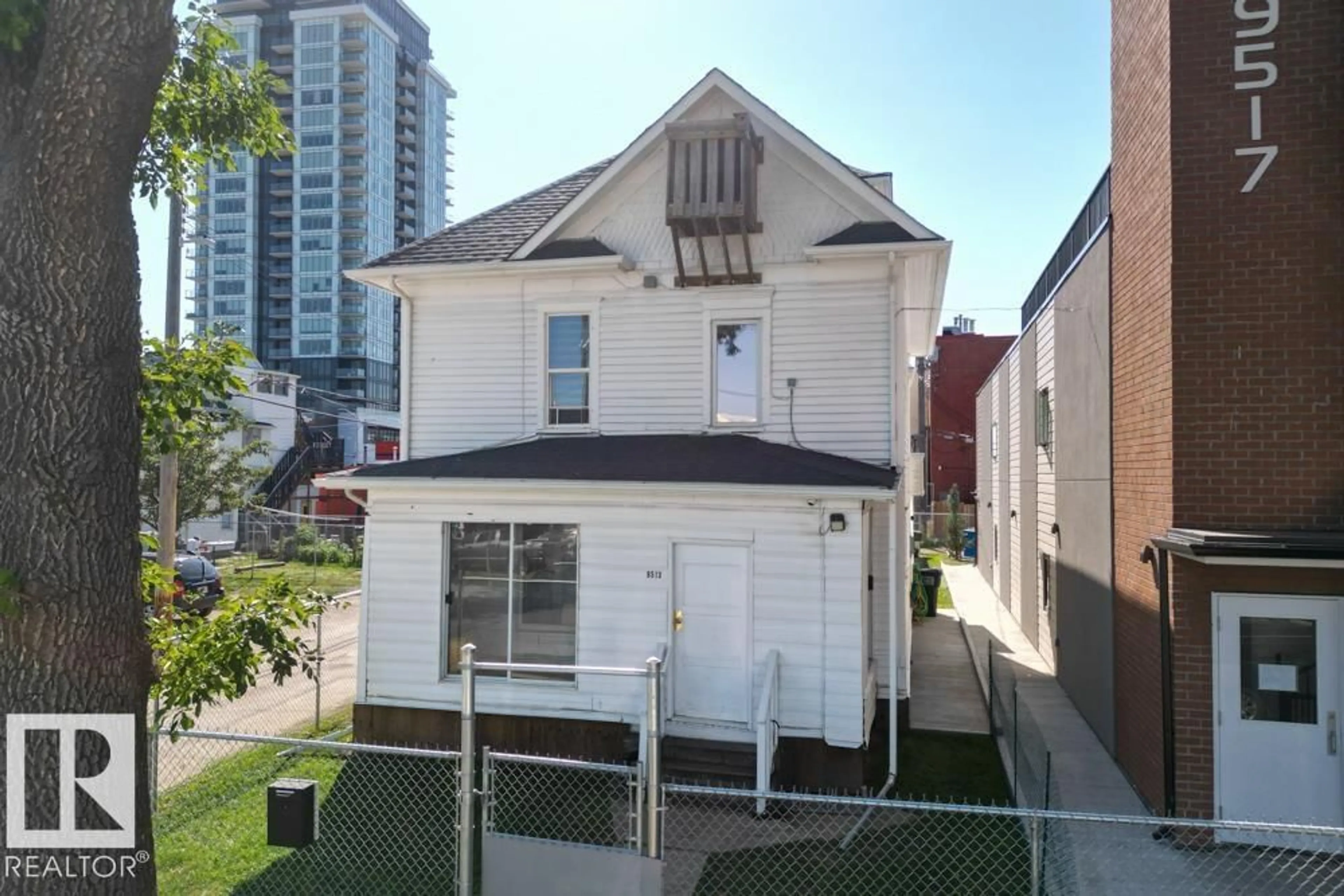 A pic from outside/outdoor area/front of a property/back of a property/a pic from drone, street for 9513 103 AV, Edmonton Alberta T5H0G8