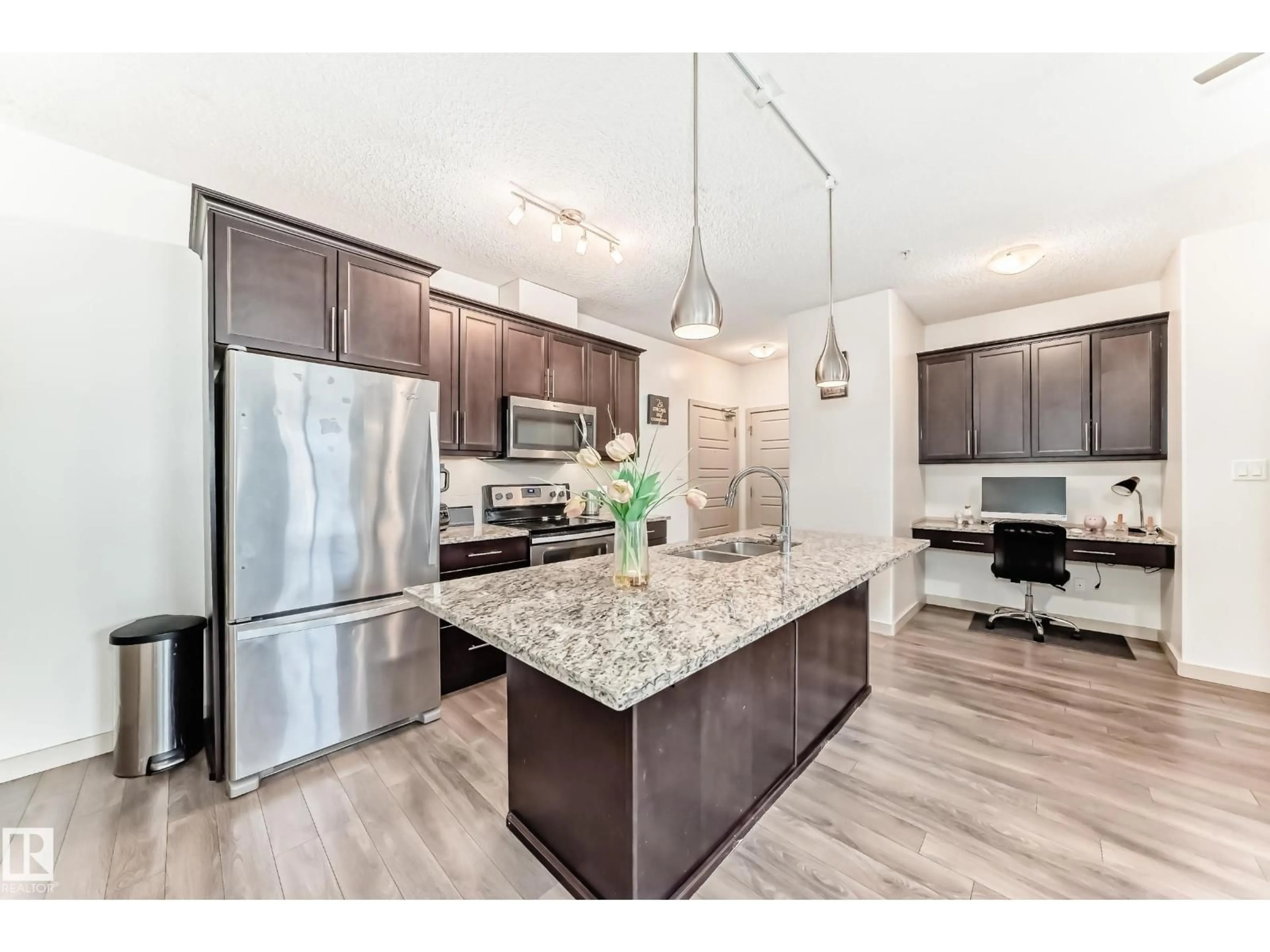 Open concept kitchen, unknown for 406 - 504 GRIESBACH PARADE PR, Edmonton Alberta T5E6V9