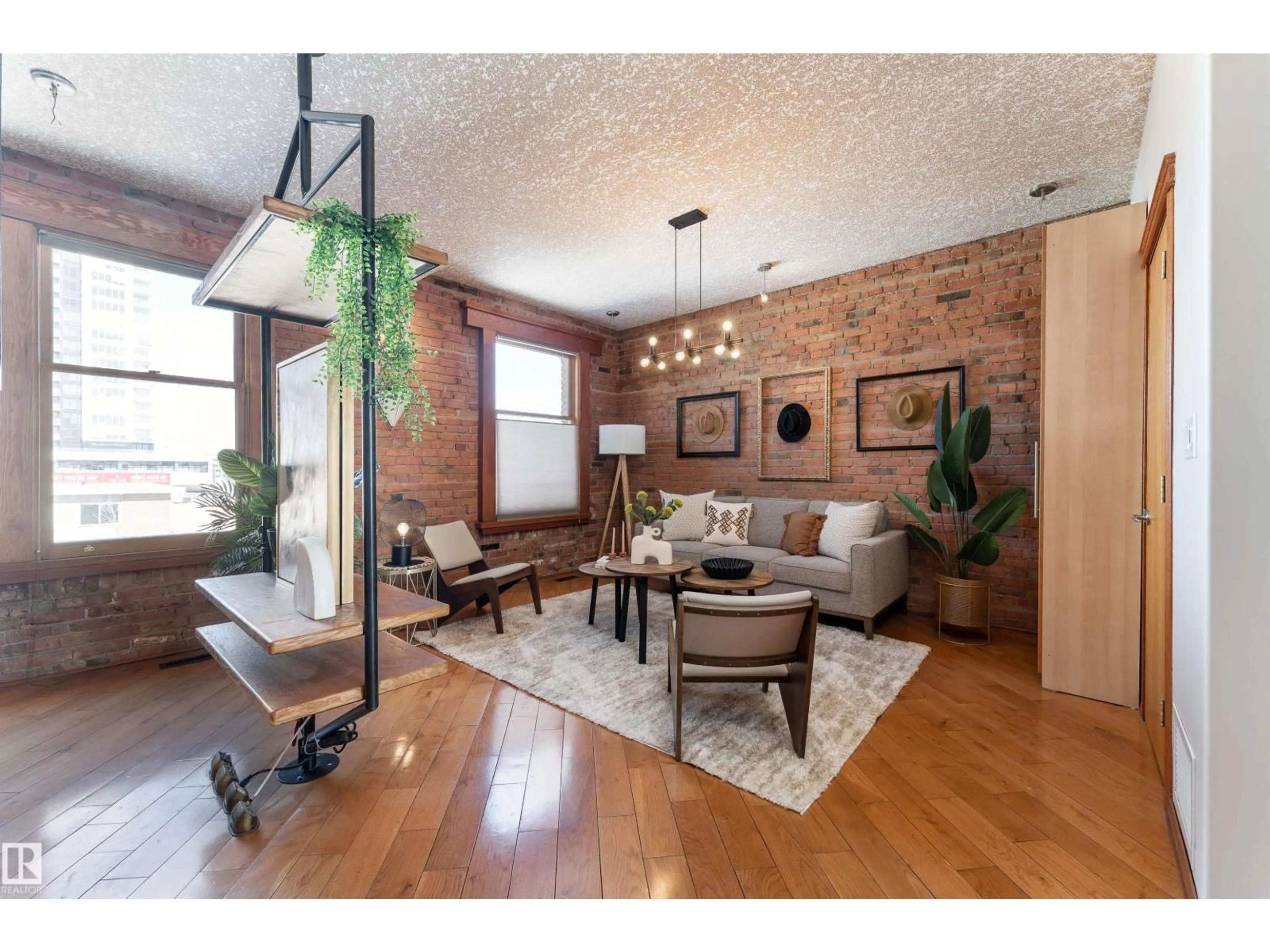 Living room with furniture, wood/laminate floor for #301 - 10141 95 ST, Edmonton Alberta T5H2A8