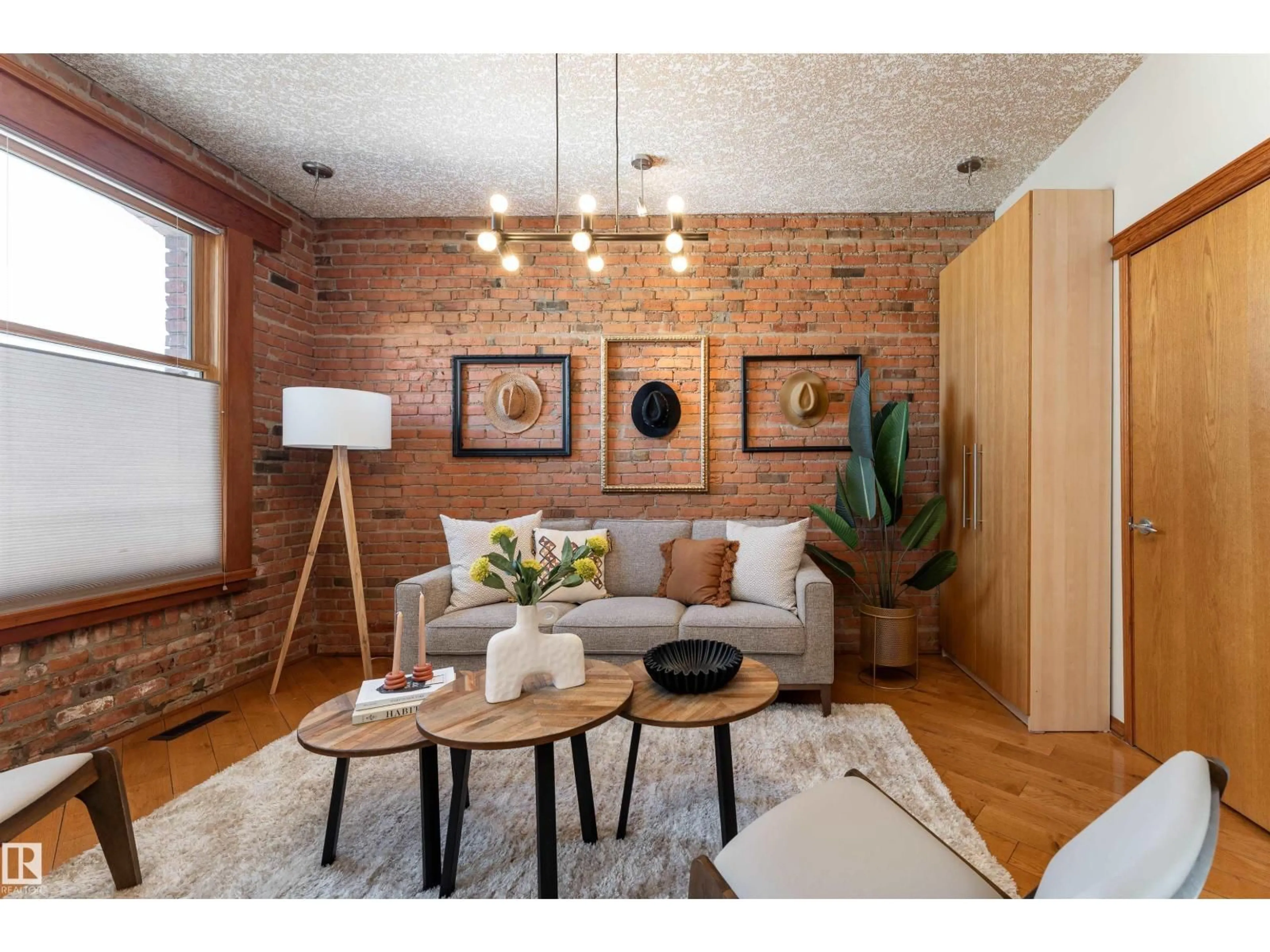 Living room with furniture, wood/laminate floor for #301 - 10141 95 ST, Edmonton Alberta T5H2A8