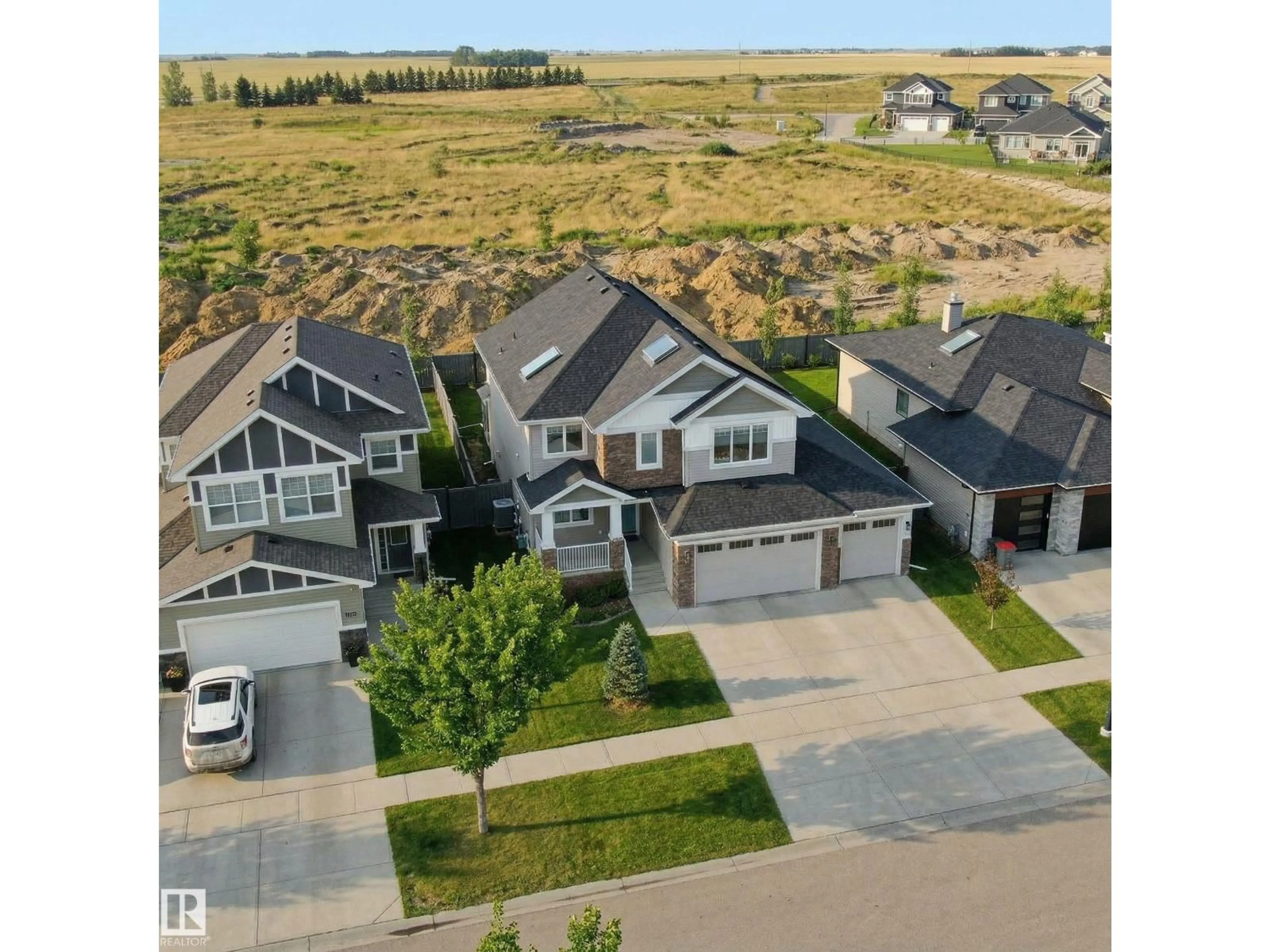 A pic from outside/outdoor area/front of a property/back of a property/a pic from drone, street for 1146 GENESIS LAKE BV, Stony Plain Alberta T7Z0K5