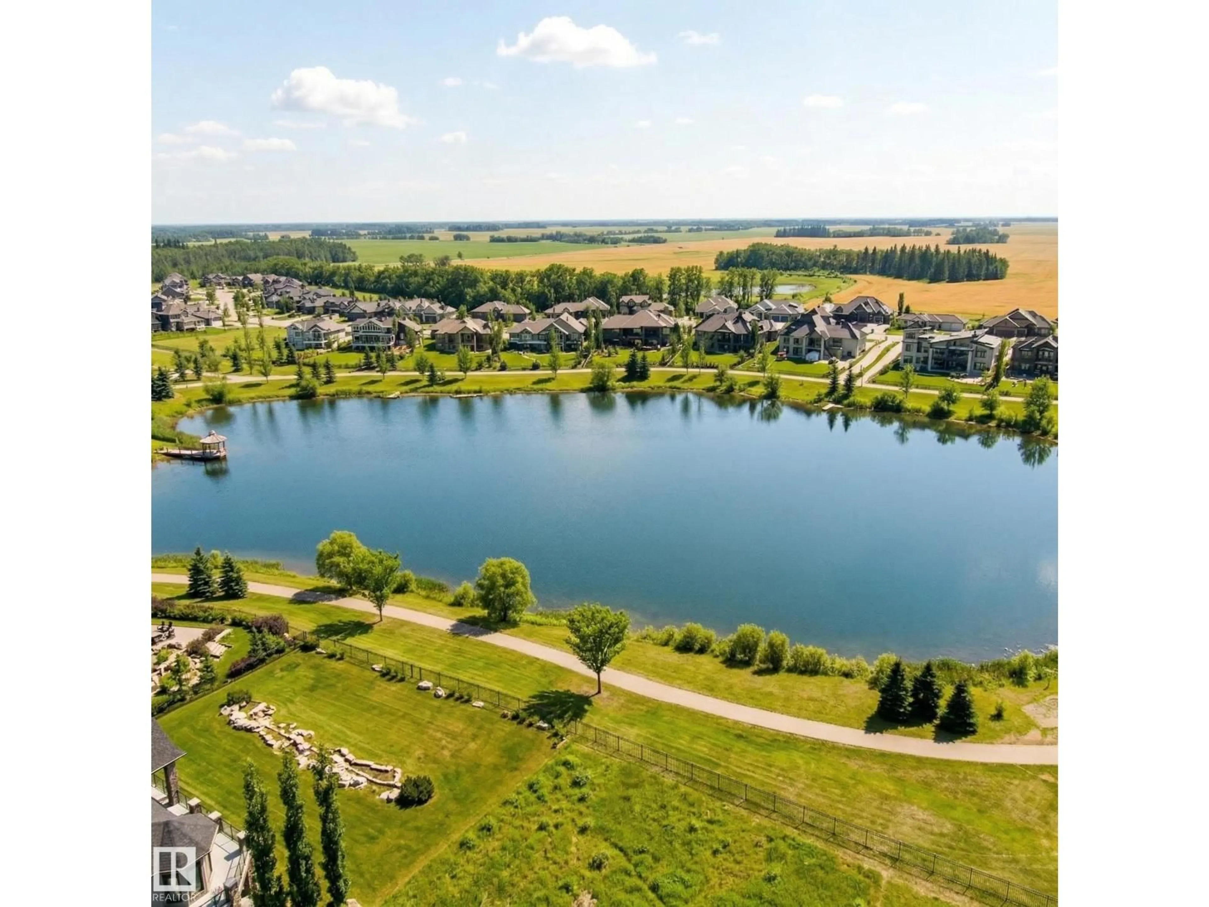 A pic from outside/outdoor area/front of a property/back of a property/a pic from drone, water/lake/river/ocean view for 1146 GENESIS LAKE BV, Stony Plain Alberta T7Z0K5