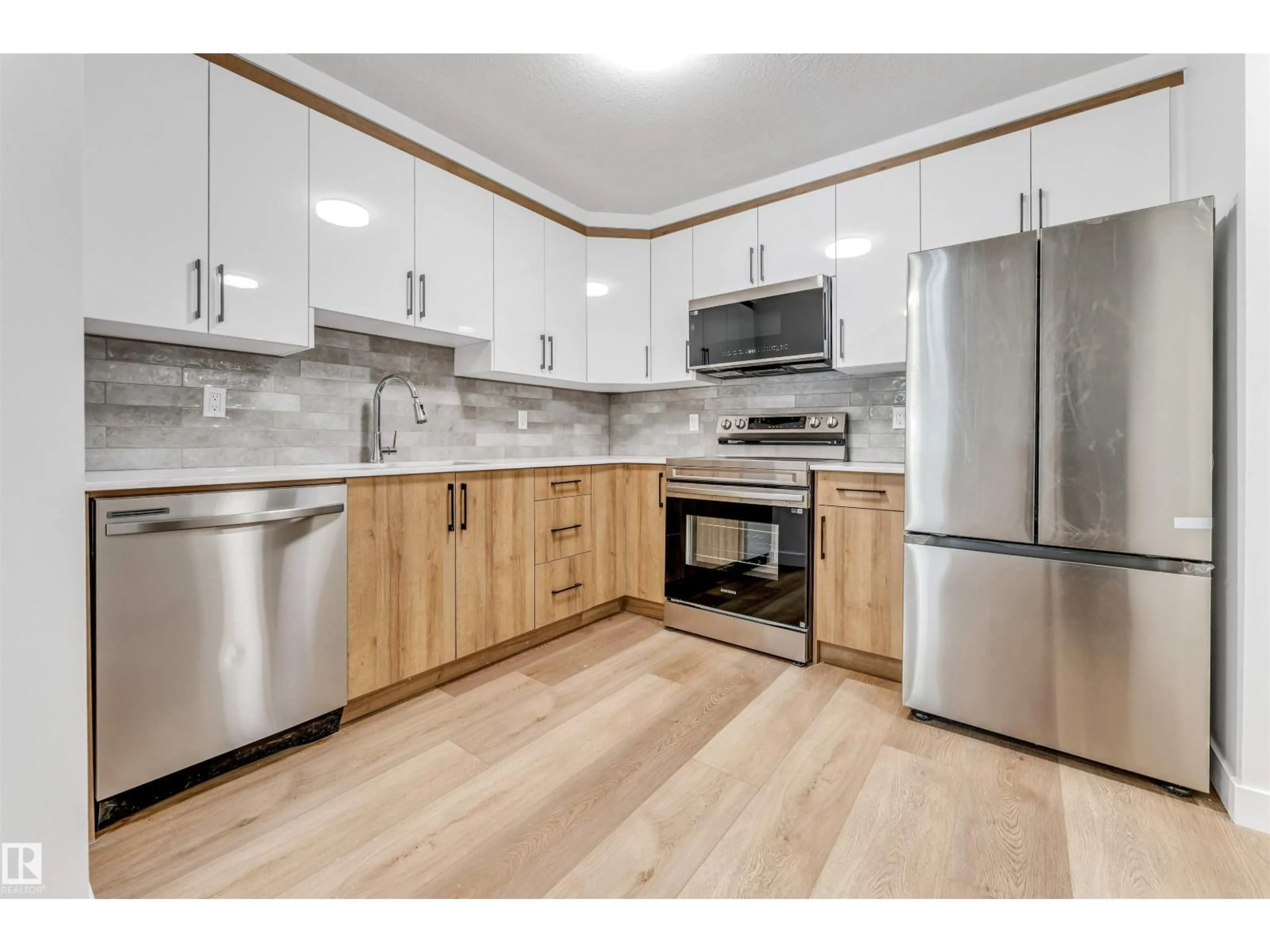 Standard kitchen, wood/laminate floor for #107 - 9760 176 ST, Edmonton Alberta T5T5Z5