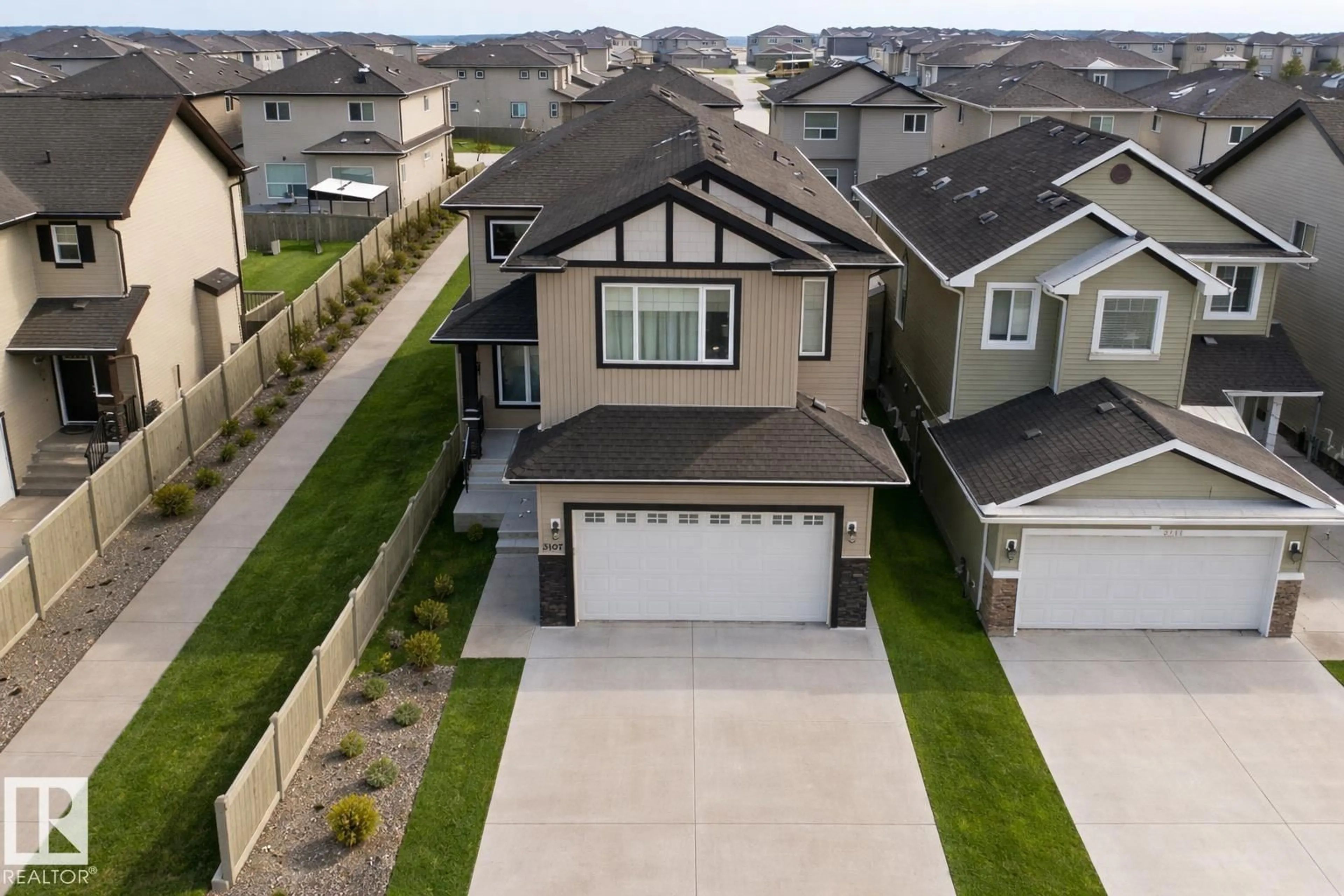 A pic from outside/outdoor area/front of a property/back of a property/a pic from drone, street for 3107 13 AV, Edmonton Alberta T6T0Z3