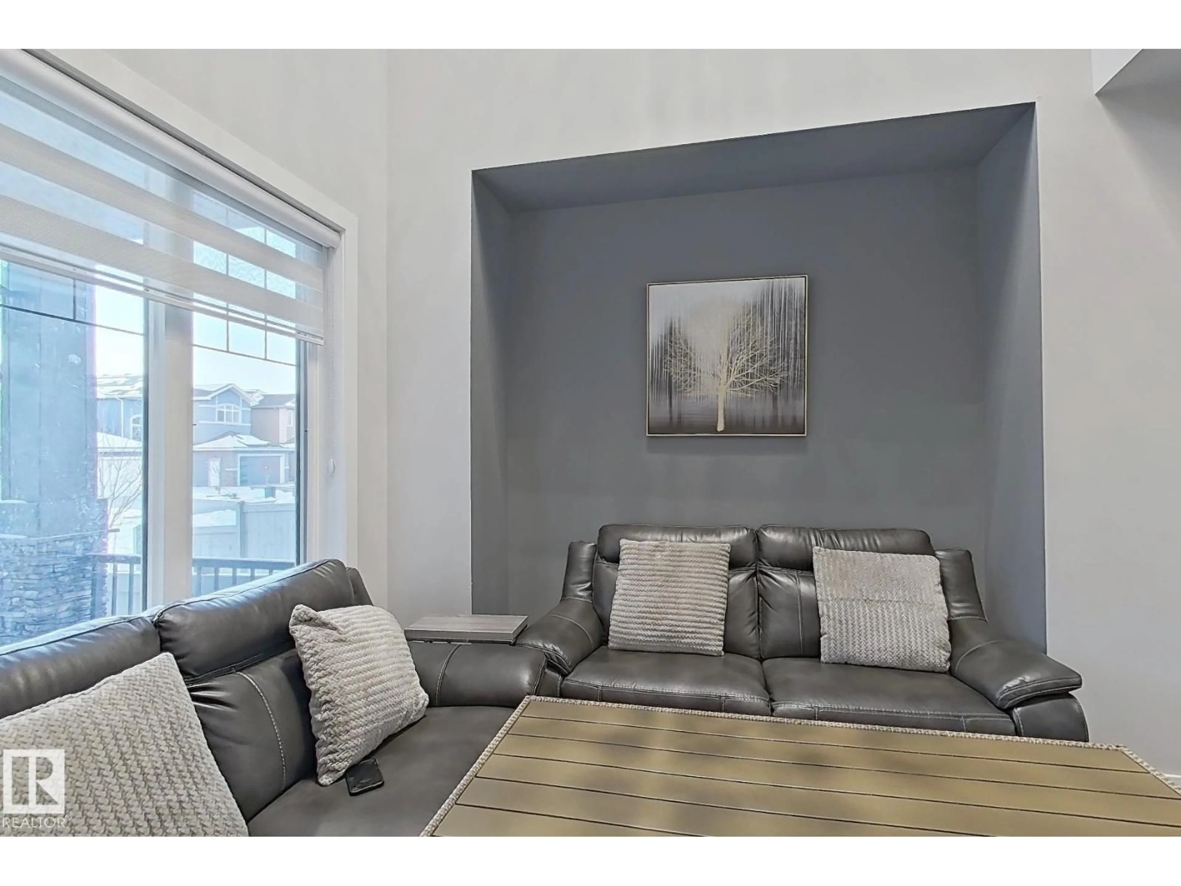 Living room with furniture, unknown for 3107 13 AV, Edmonton Alberta T6T0Z3