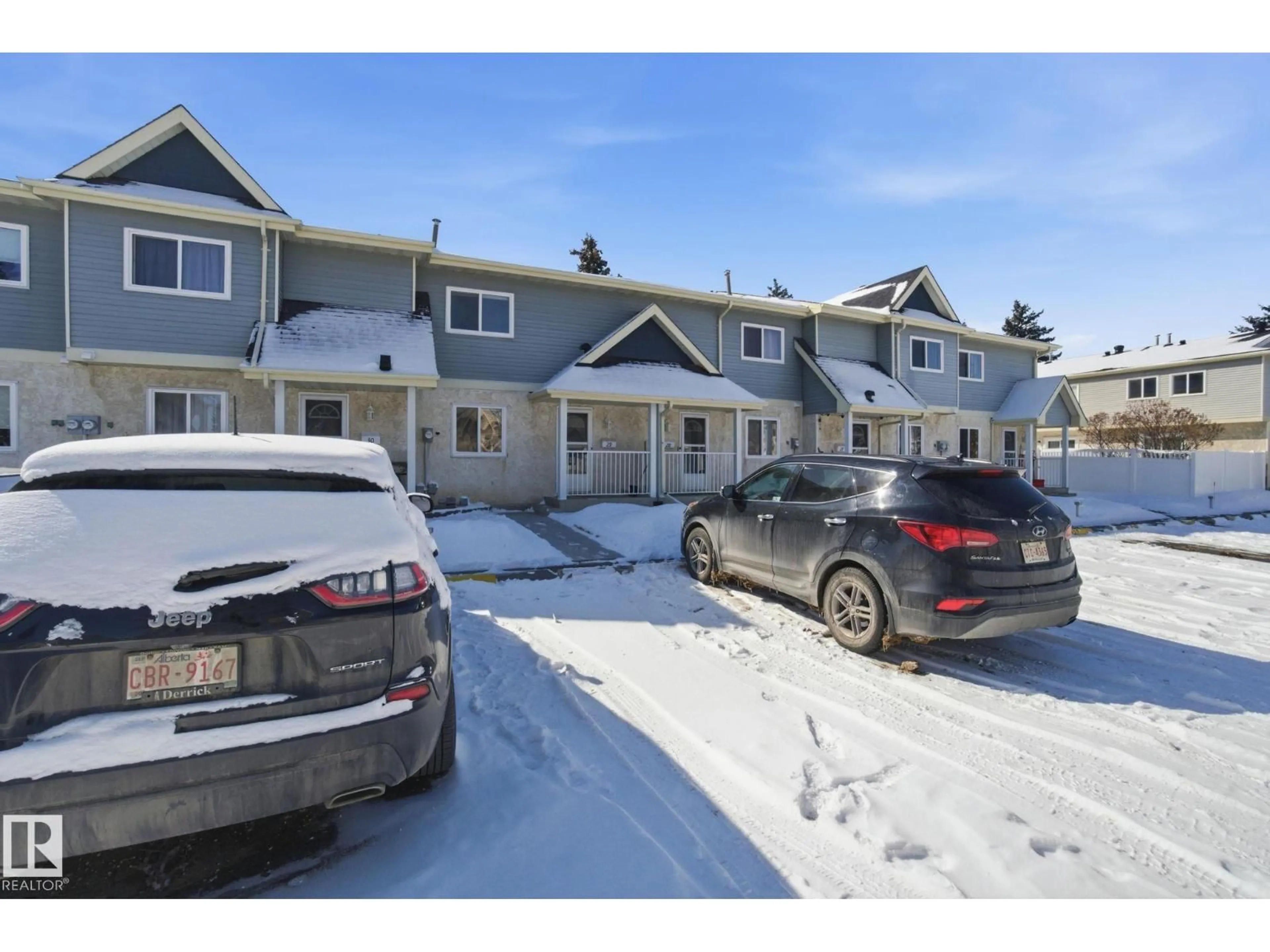 A pic from outside/outdoor area/front of a property/back of a property/a pic from drone, street for #29 - 9619 180 ST NW, Edmonton Alberta T5T4L9