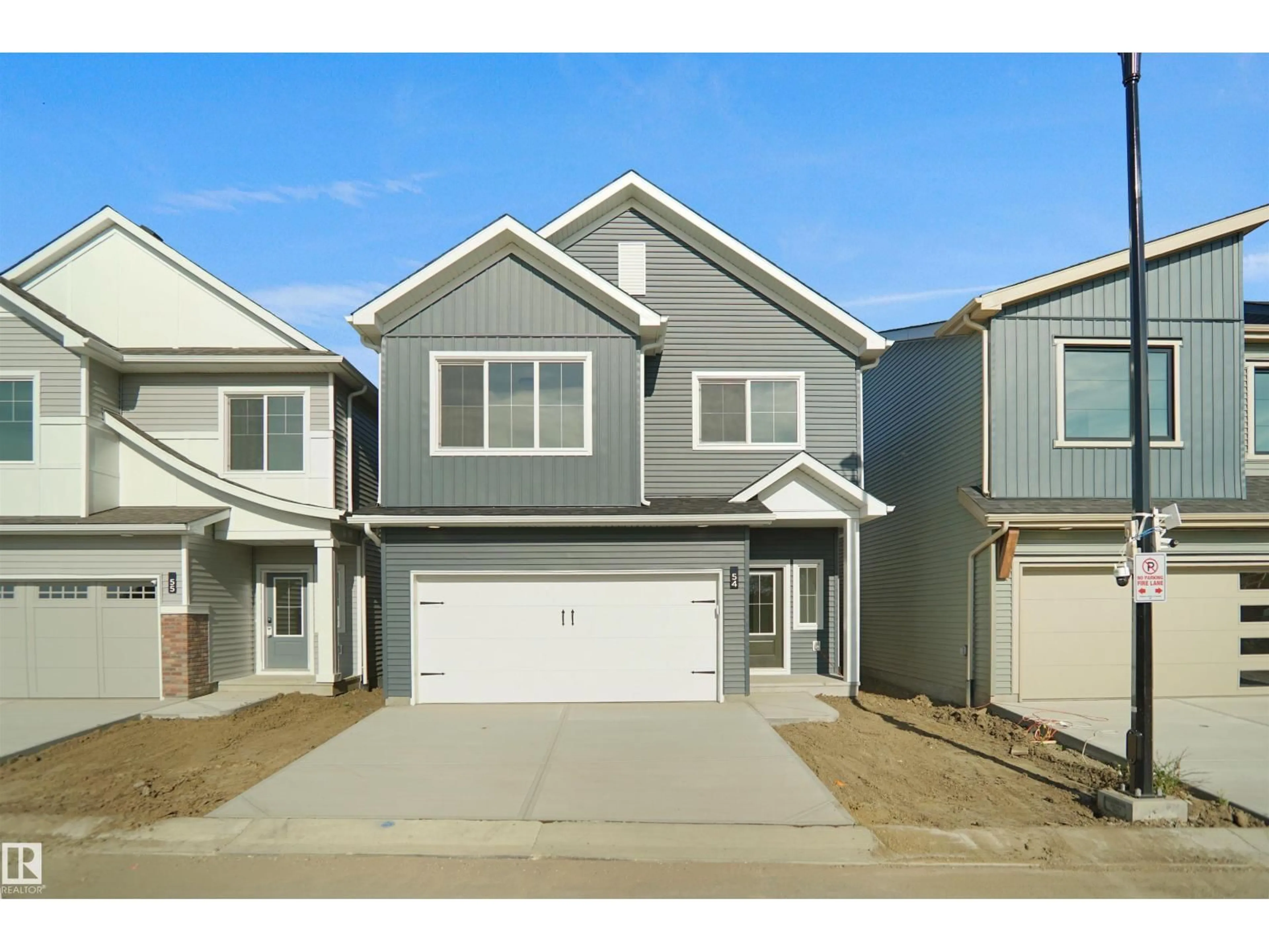 Home with vinyl exterior material, street for 19904 - 54 31 AV, Edmonton Alberta T6M1N7