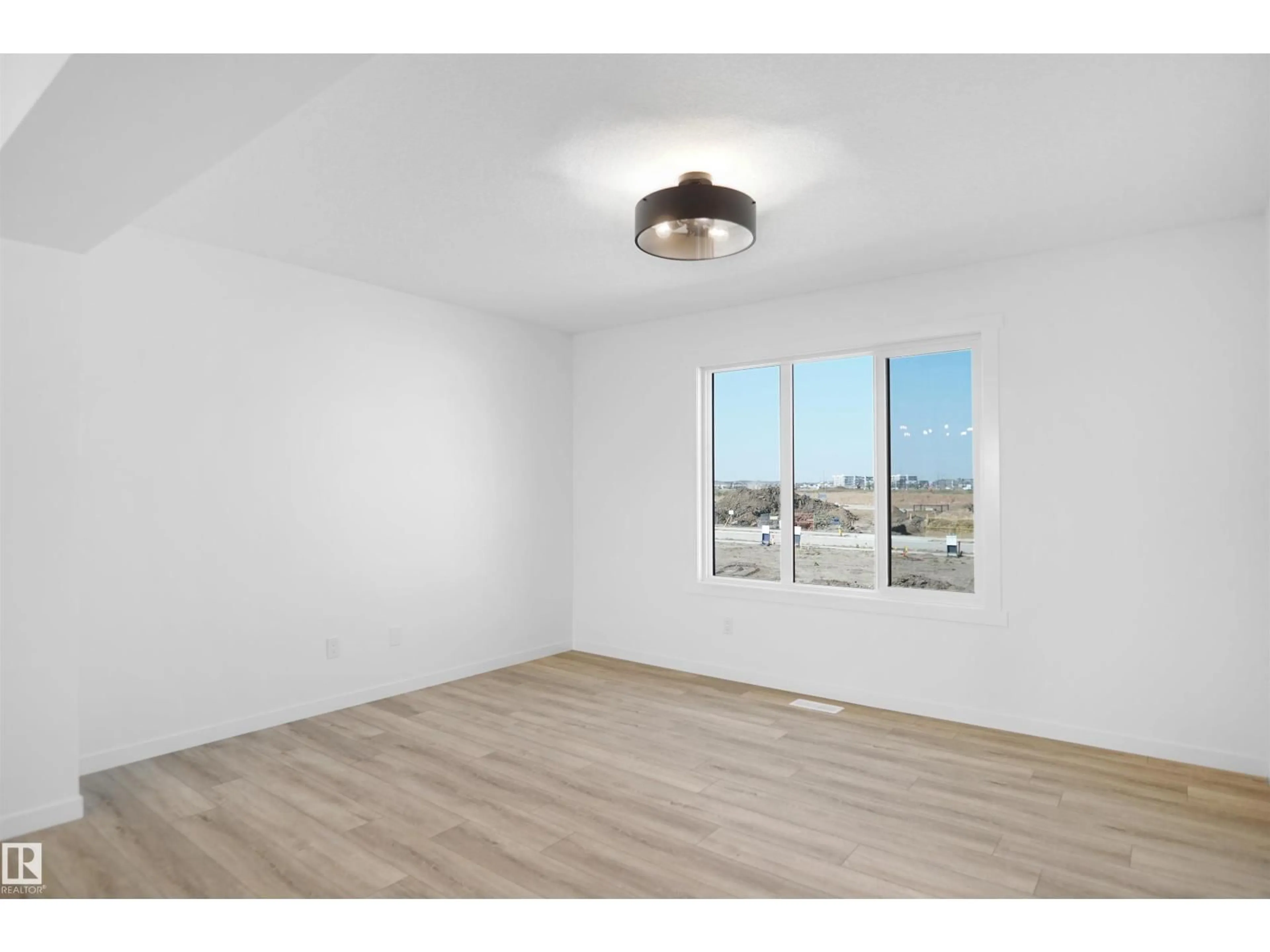 A pic of a room for #100 - 3705 141 ST, Edmonton Alberta T6W3J2