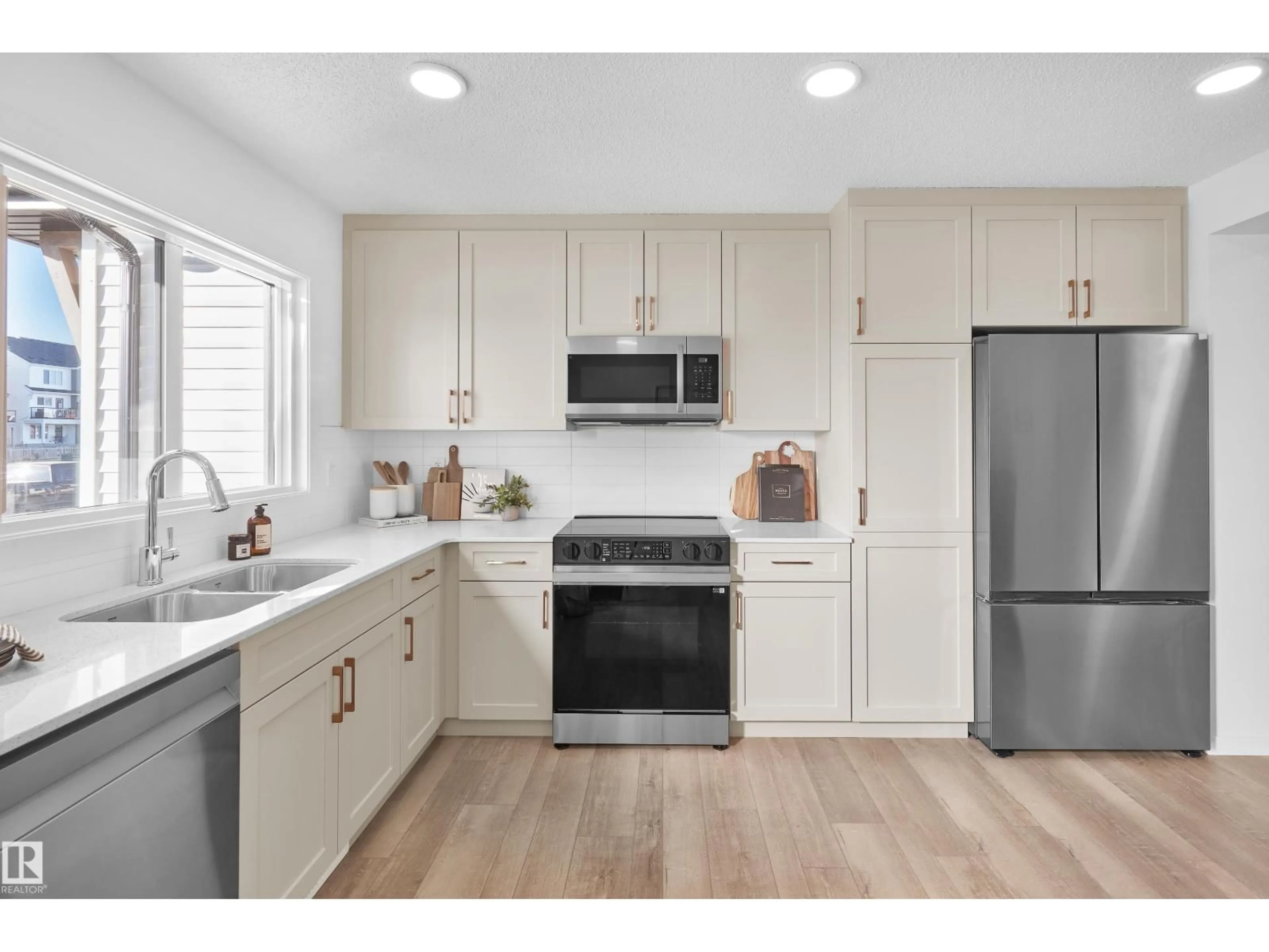 Open concept kitchen, unknown for NW - 3 18636 18 AV, Edmonton Alberta T6M3E8