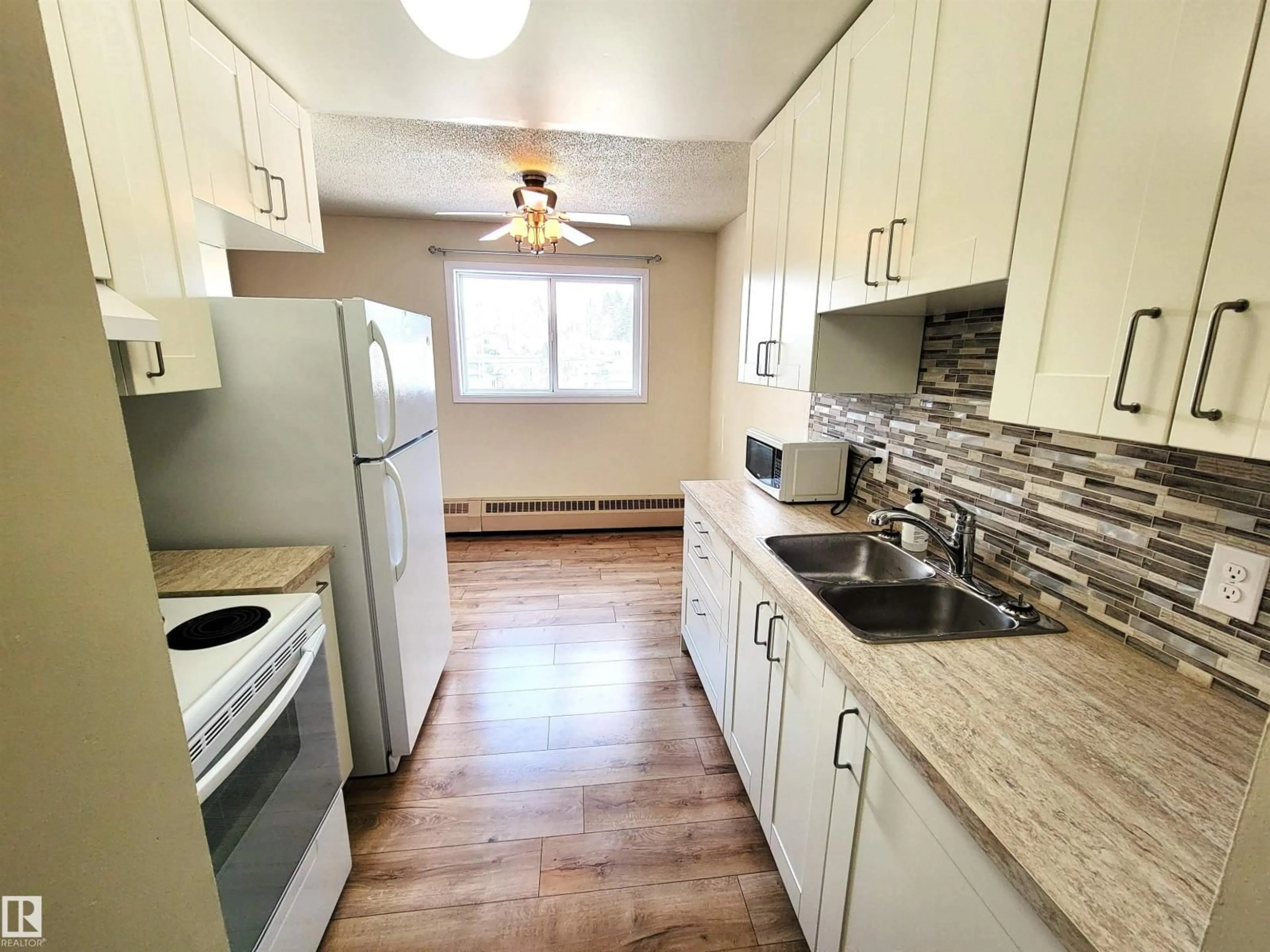 Standard kitchen, wood/laminate floor for 201 - 911 10 ST, Cold Lake Alberta T9M1J8