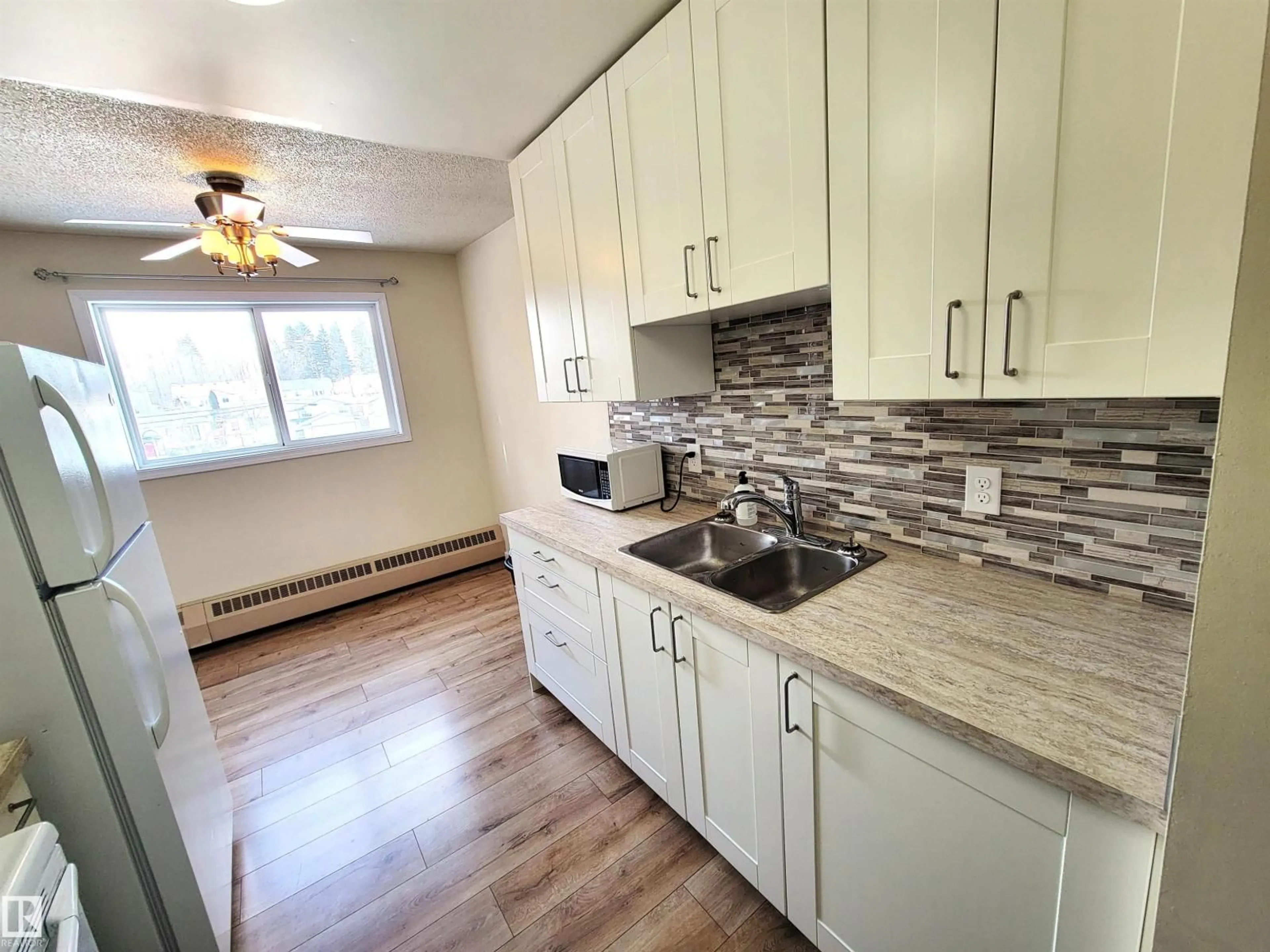 Standard kitchen, wood/laminate floor for 201 - 911 10 ST, Cold Lake Alberta T9M1J8