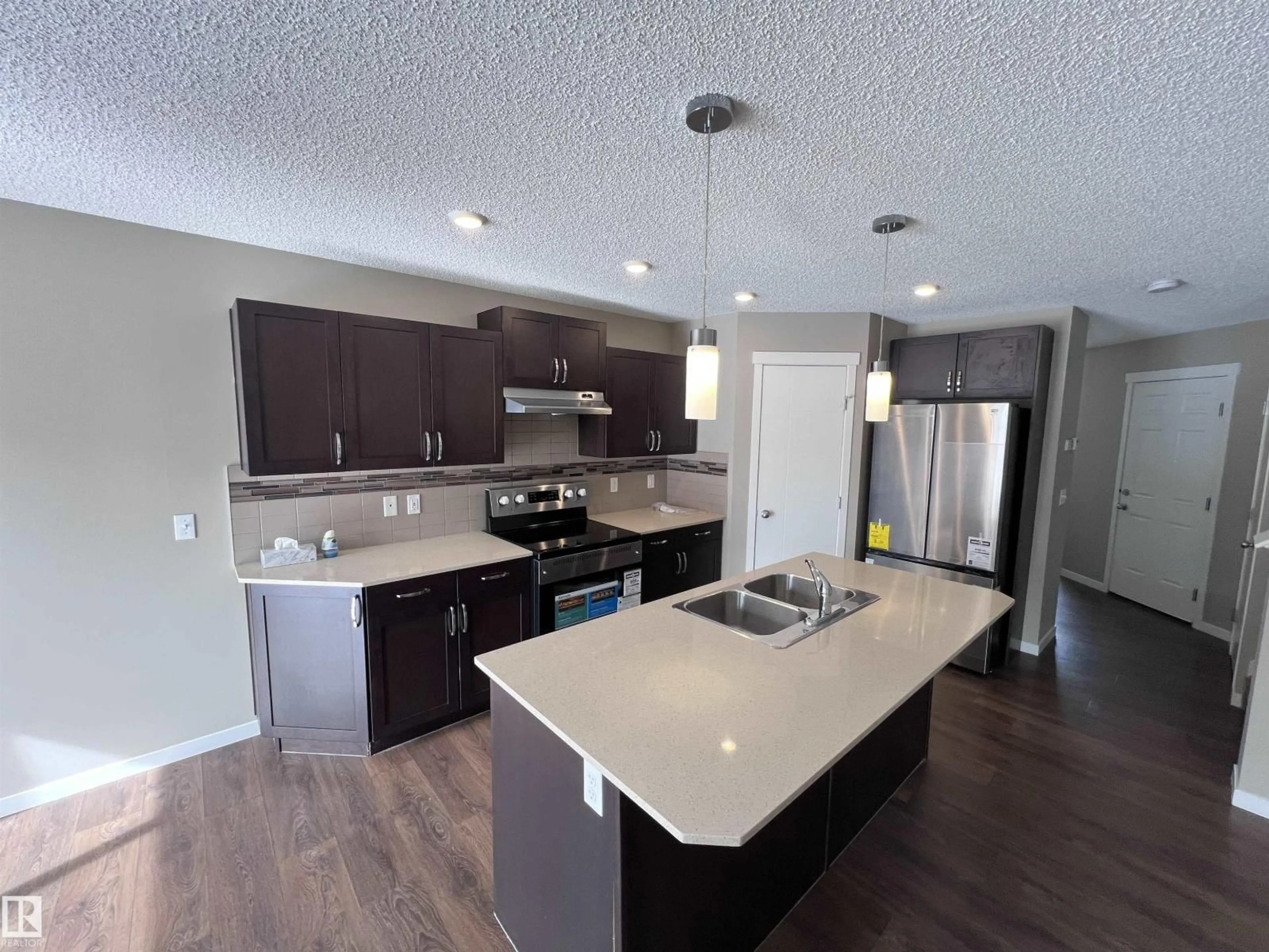 Open concept kitchen, unknown for 1421 26 AV, Edmonton Alberta T6T0W1