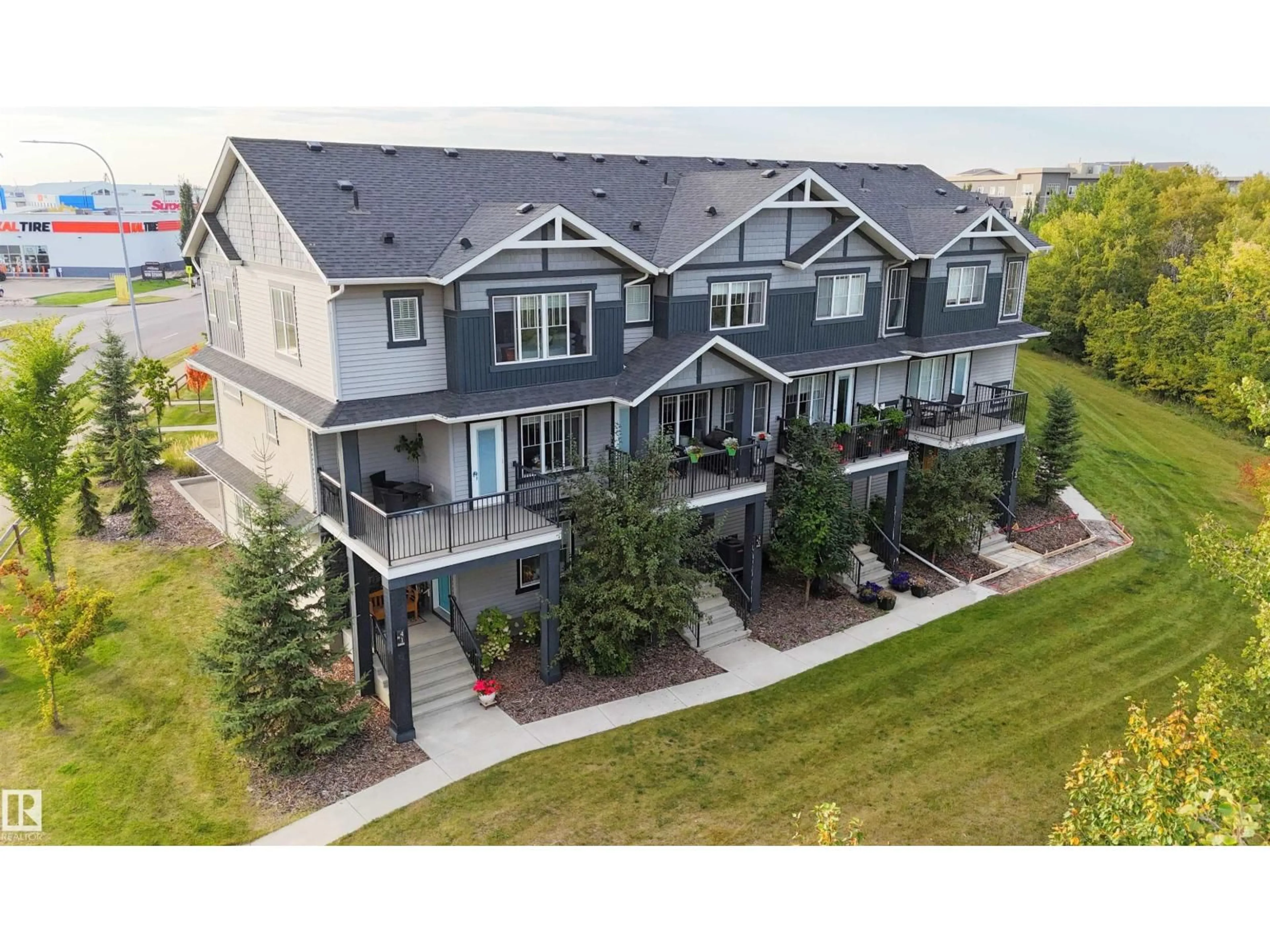 A pic from outside/outdoor area/front of a property/back of a property/a pic from drone, mountain view for 41 - 50 MCLAUGHLIN DR, Spruce Grove Alberta T7X0E1