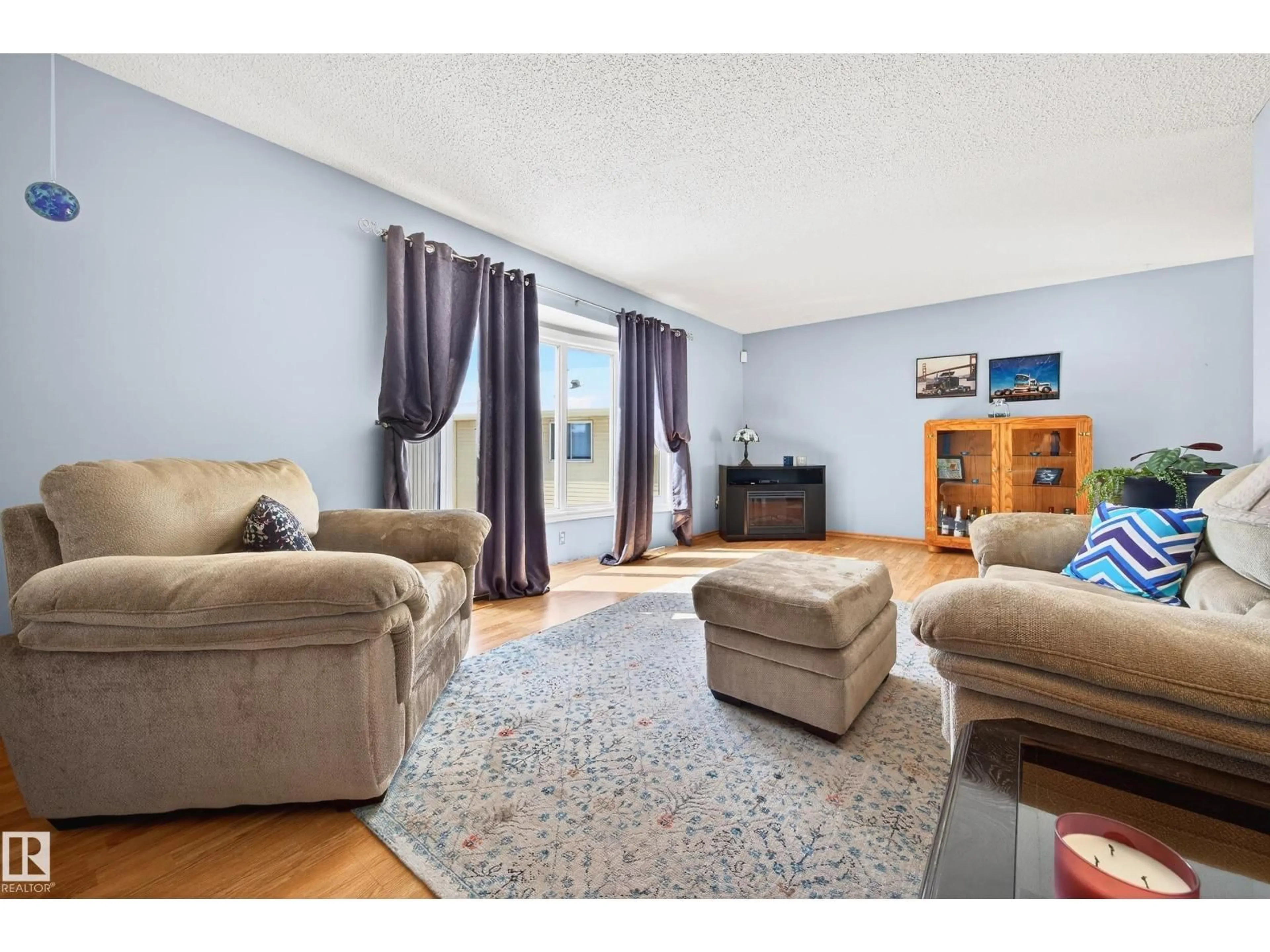 Living room with furniture, unknown for 4112 30 AV, Edmonton Alberta T6L3W4