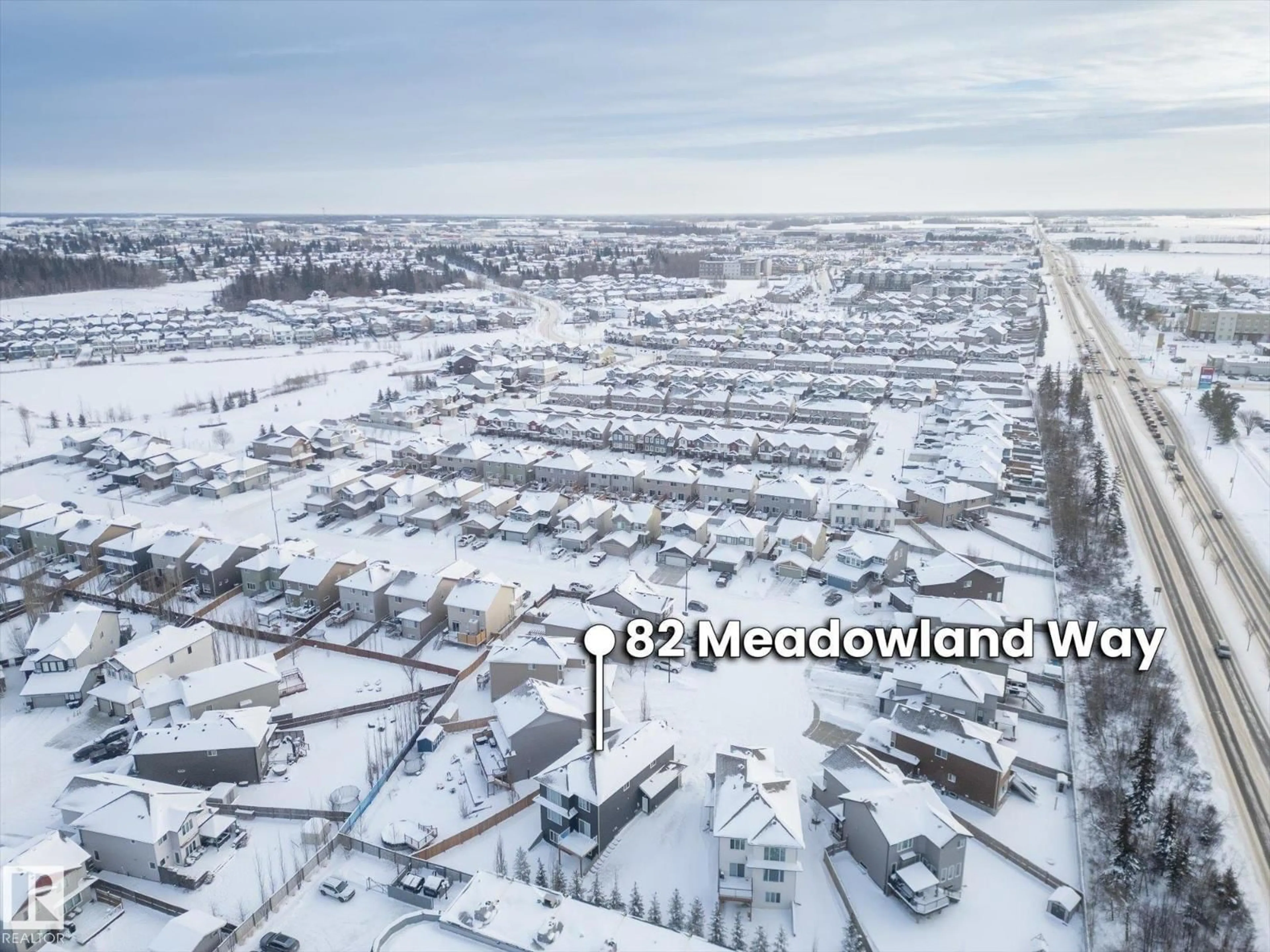 A pic from outside/outdoor area/front of a property/back of a property/a pic from drone, mountain view for 82 MEADOWLAND WY, Spruce Grove Alberta T7X0S4