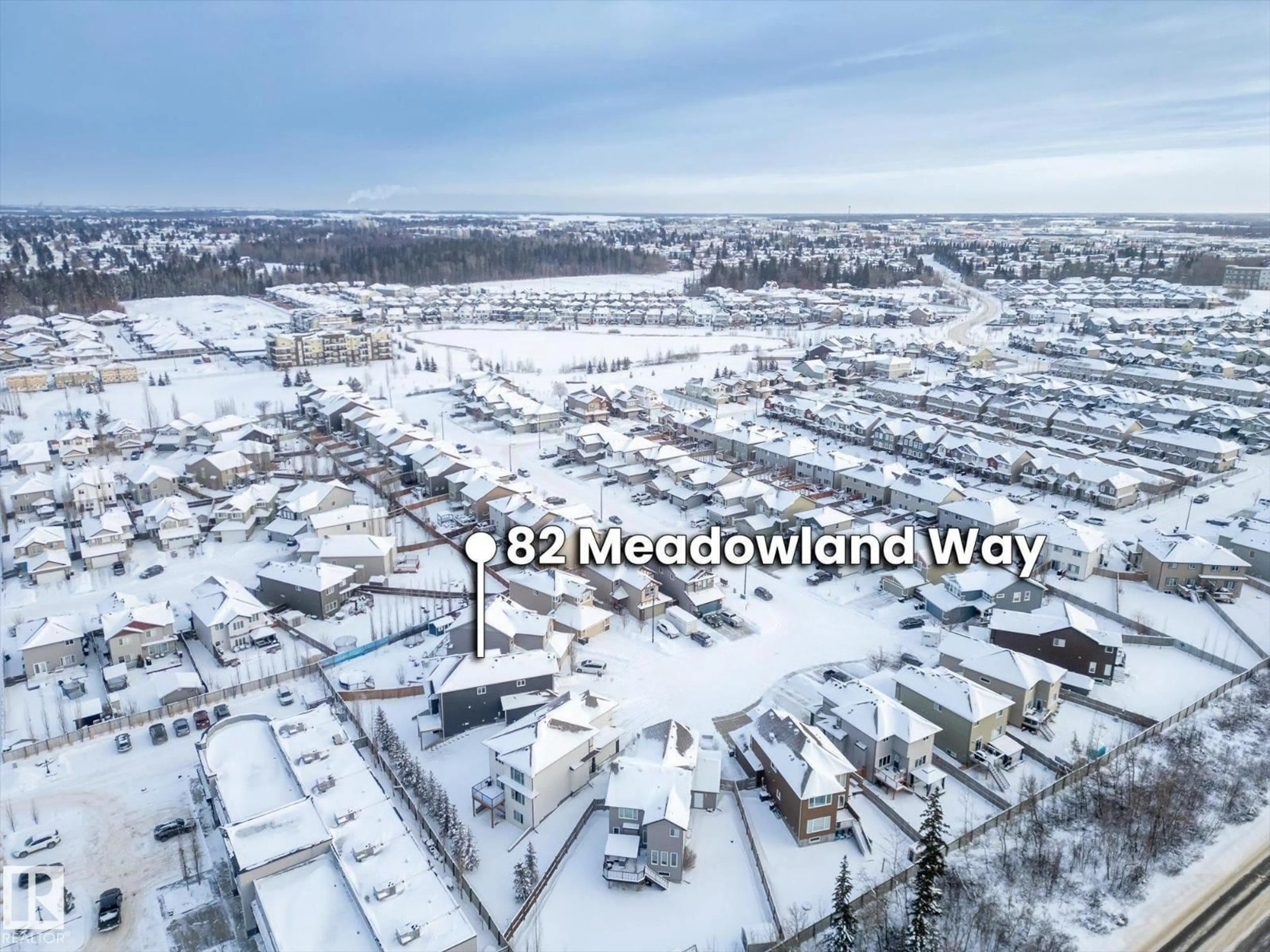 A pic from outside/outdoor area/front of a property/back of a property/a pic from drone, mountain view for 82 MEADOWLAND WY, Spruce Grove Alberta T7X0S4