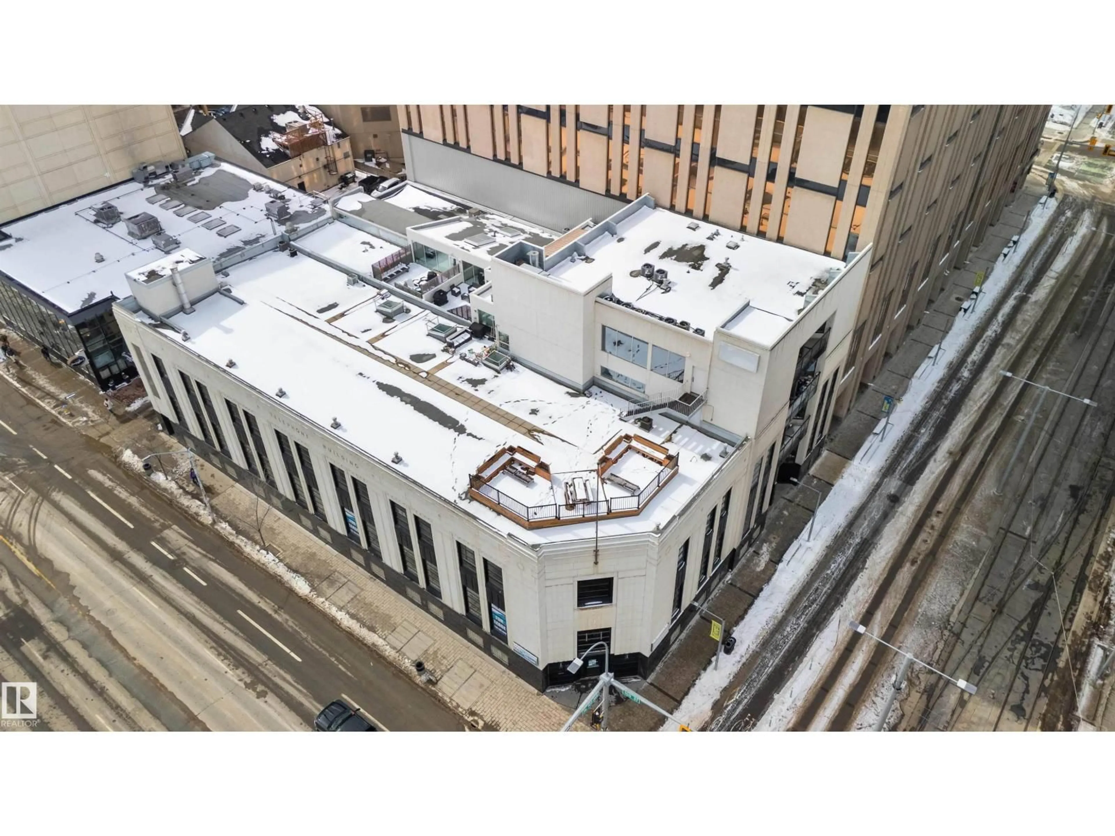 A pic from outside/outdoor area/front of a property/back of a property/a pic from drone, building for 401 - 10009 102 AV, Edmonton Alberta T5J5B6