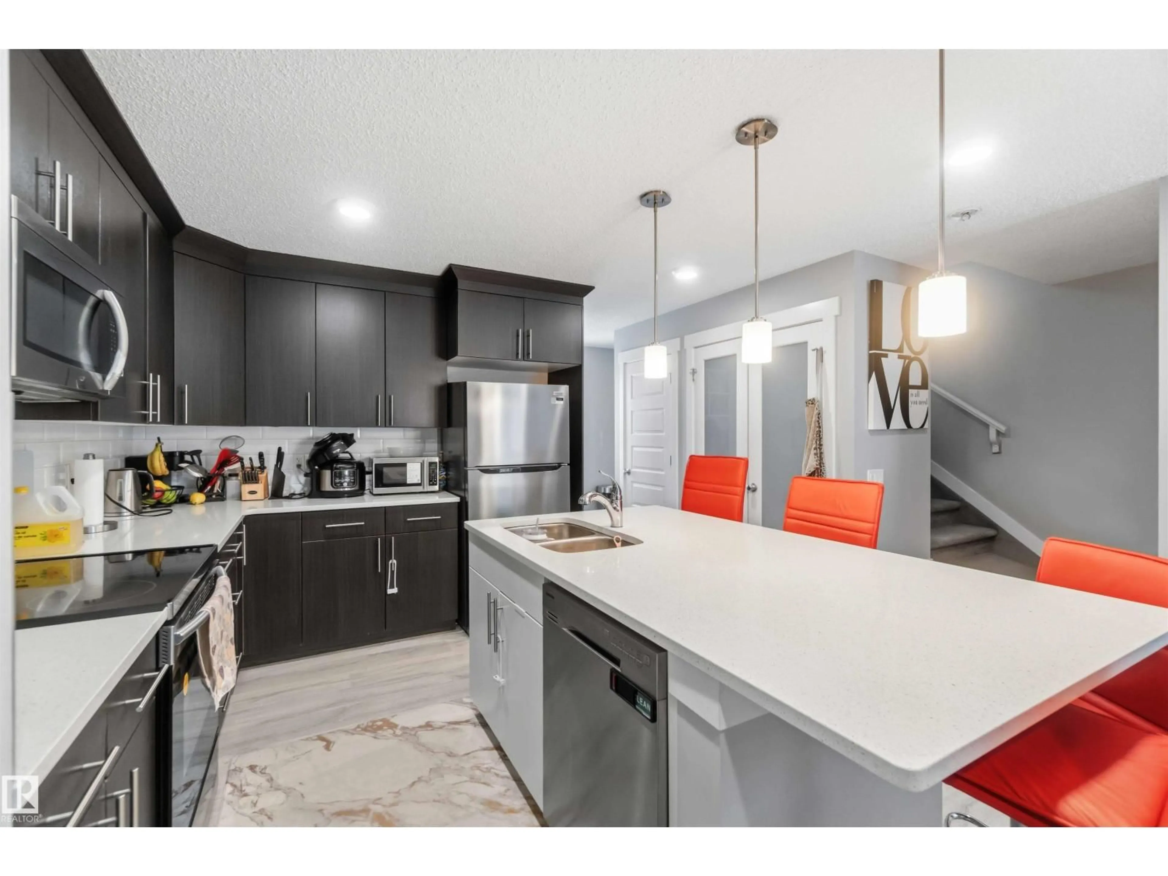 Open concept kitchen, ceramic/tile floor for 1313 CHAPPELLE BV, Edmonton Alberta T6W3S2
