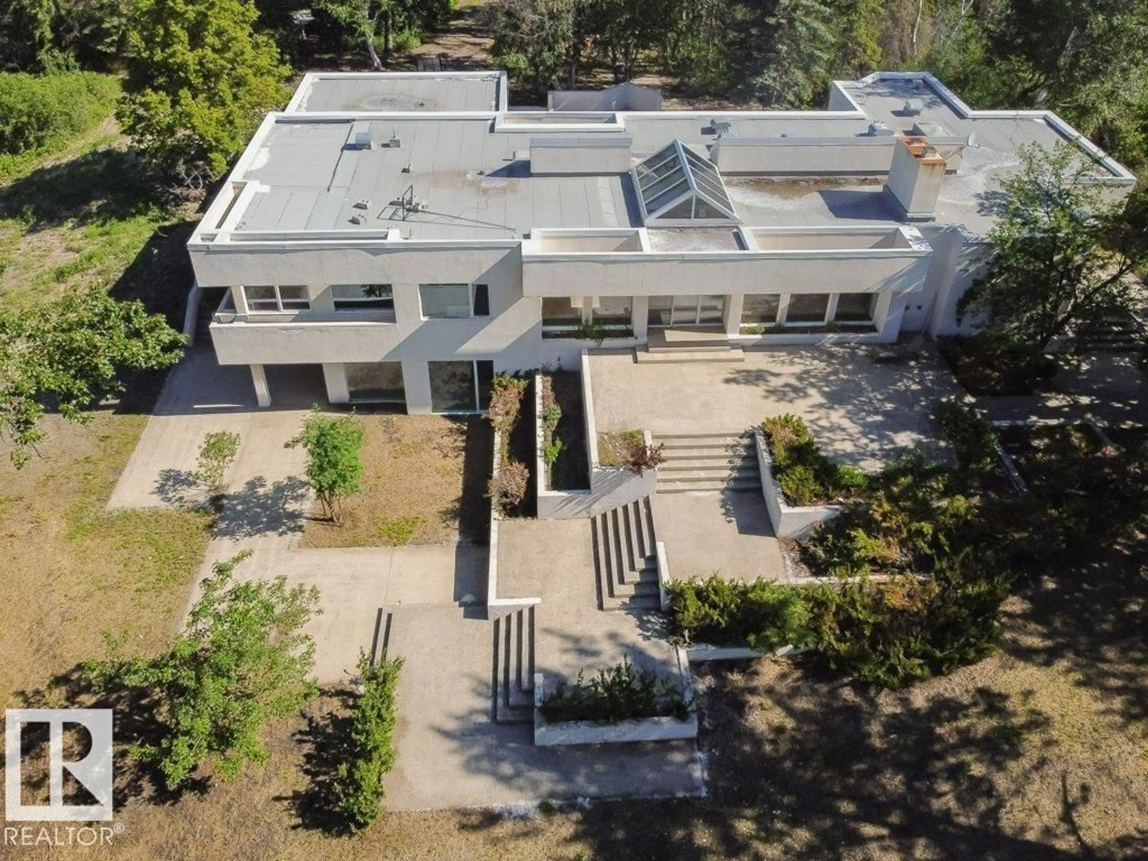 A pic from outside/outdoor area/front of a property/back of a property/a pic from drone, building for 3A - 51112 RGE RD 260, Rural Parkland County Alberta T7Y1B2