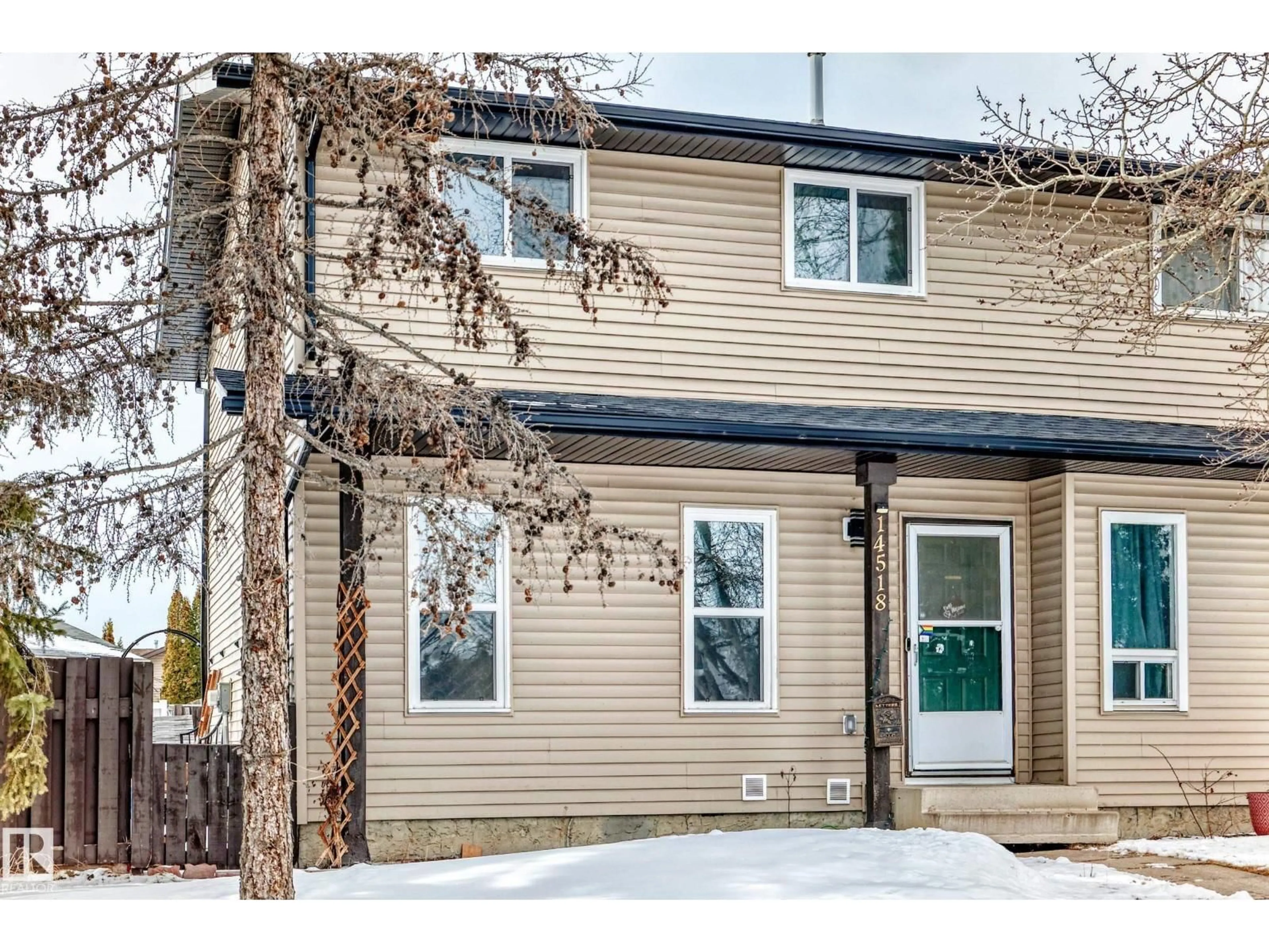 Home with vinyl exterior material, street for NW - 14518 23 ST, Edmonton Alberta T5Y1T5