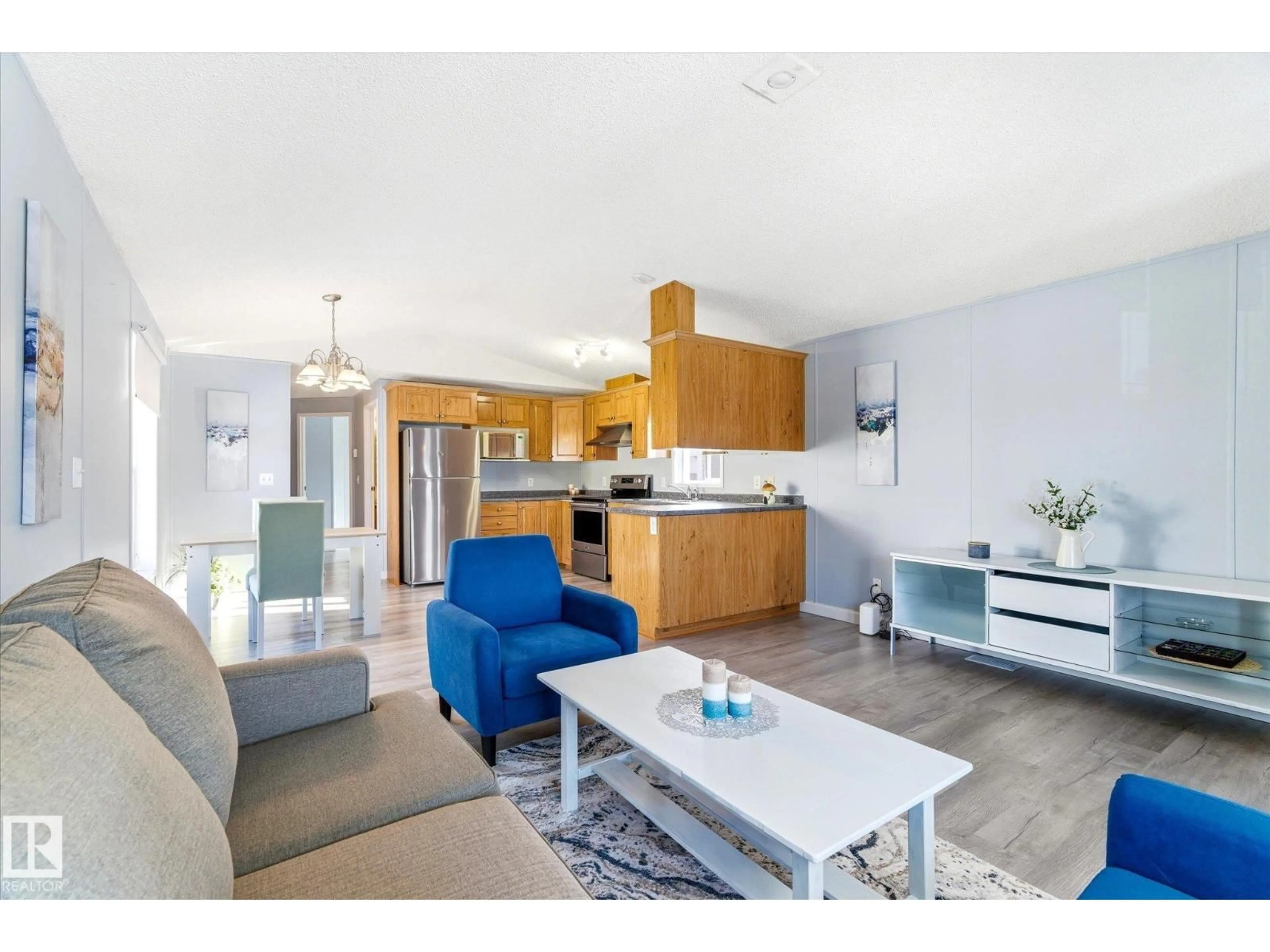 Open concept kitchen, wood/laminate floor for 1160 ASPEN DR, Leduc Alberta T9E8R2