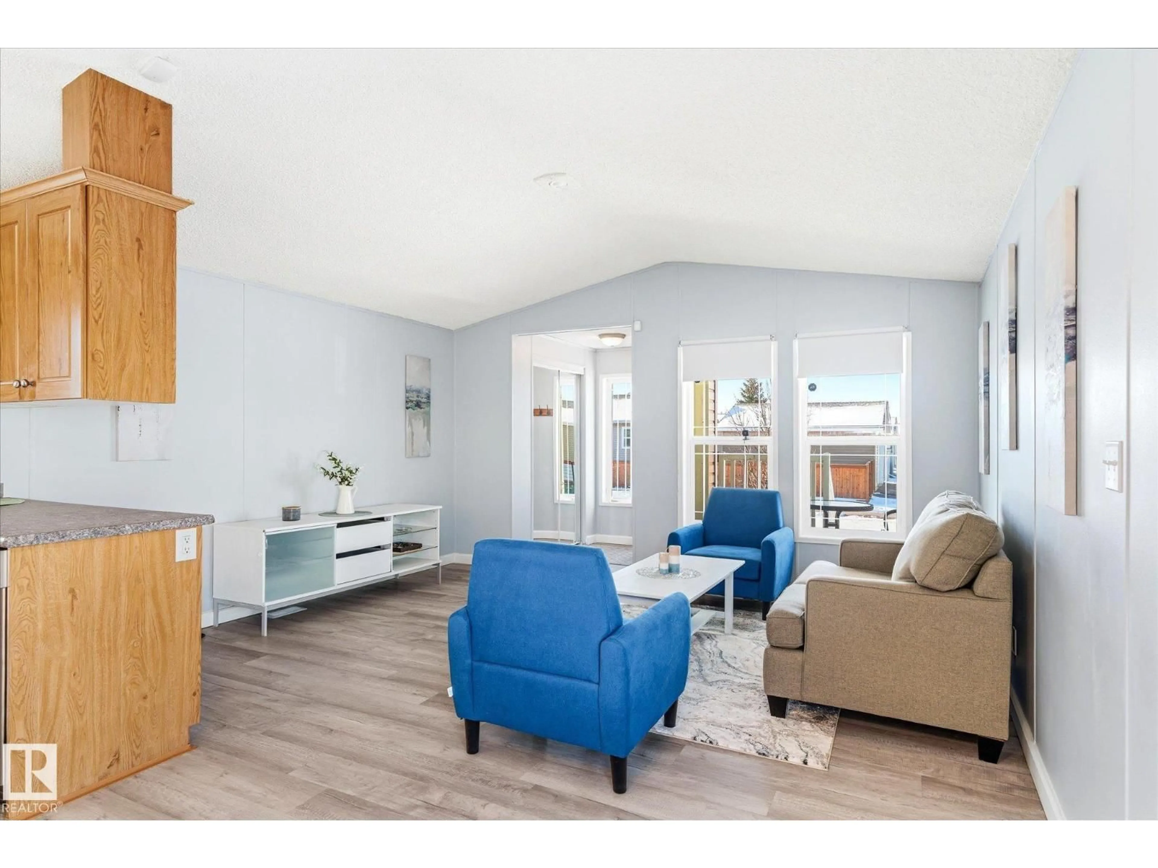 Living room with furniture, wood/laminate floor for 1160 ASPEN DR, Leduc Alberta T9E8R2