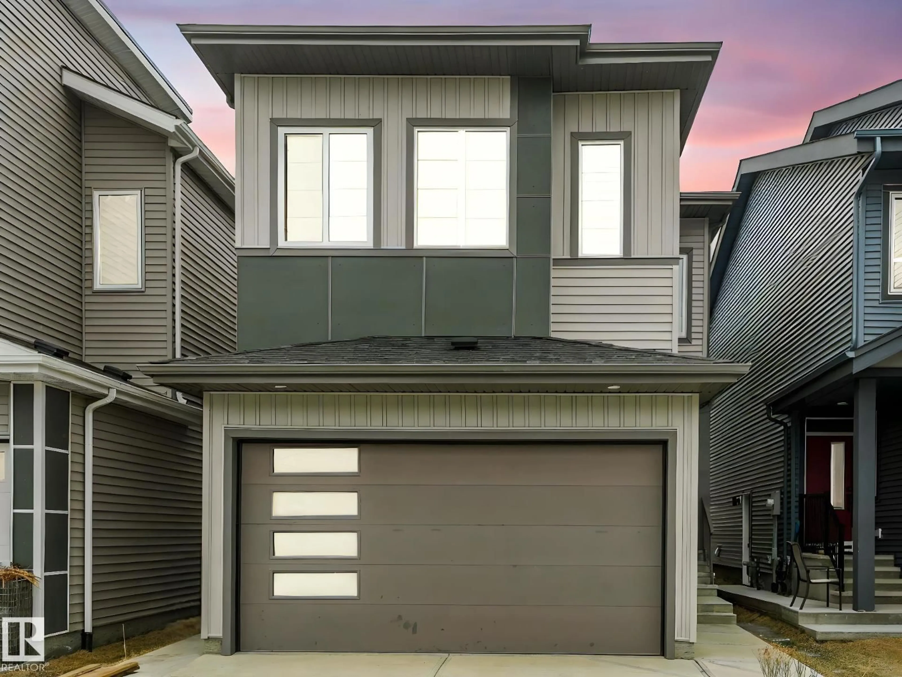 Home with vinyl exterior material, street for NW - 2423 205 ST, Edmonton Alberta T6M1N6
