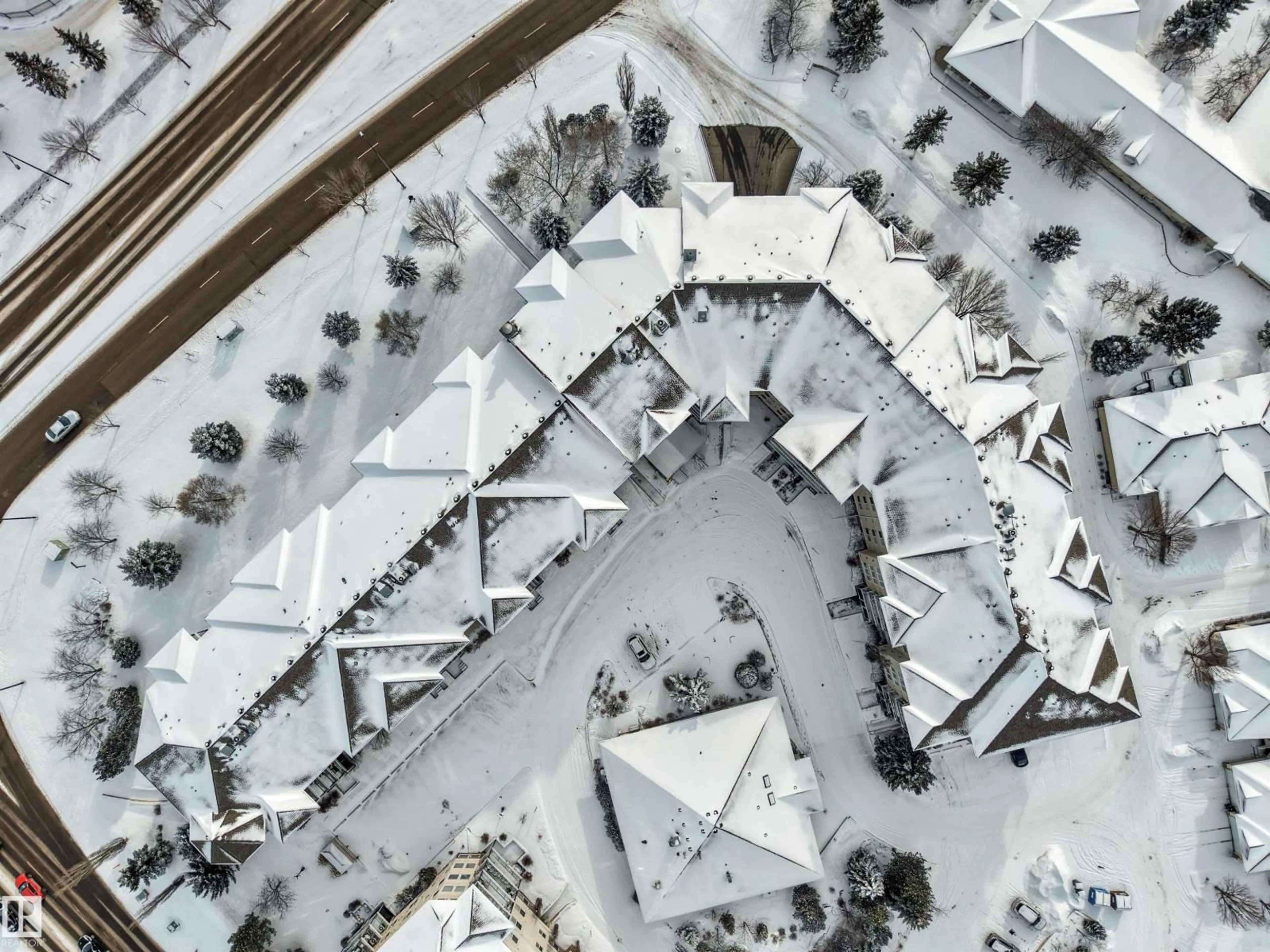 A pic from outside/outdoor area/front of a property/back of a property/a pic from drone, street for 237 - 316 YOUVILLE DR, Edmonton Alberta T6L7G2