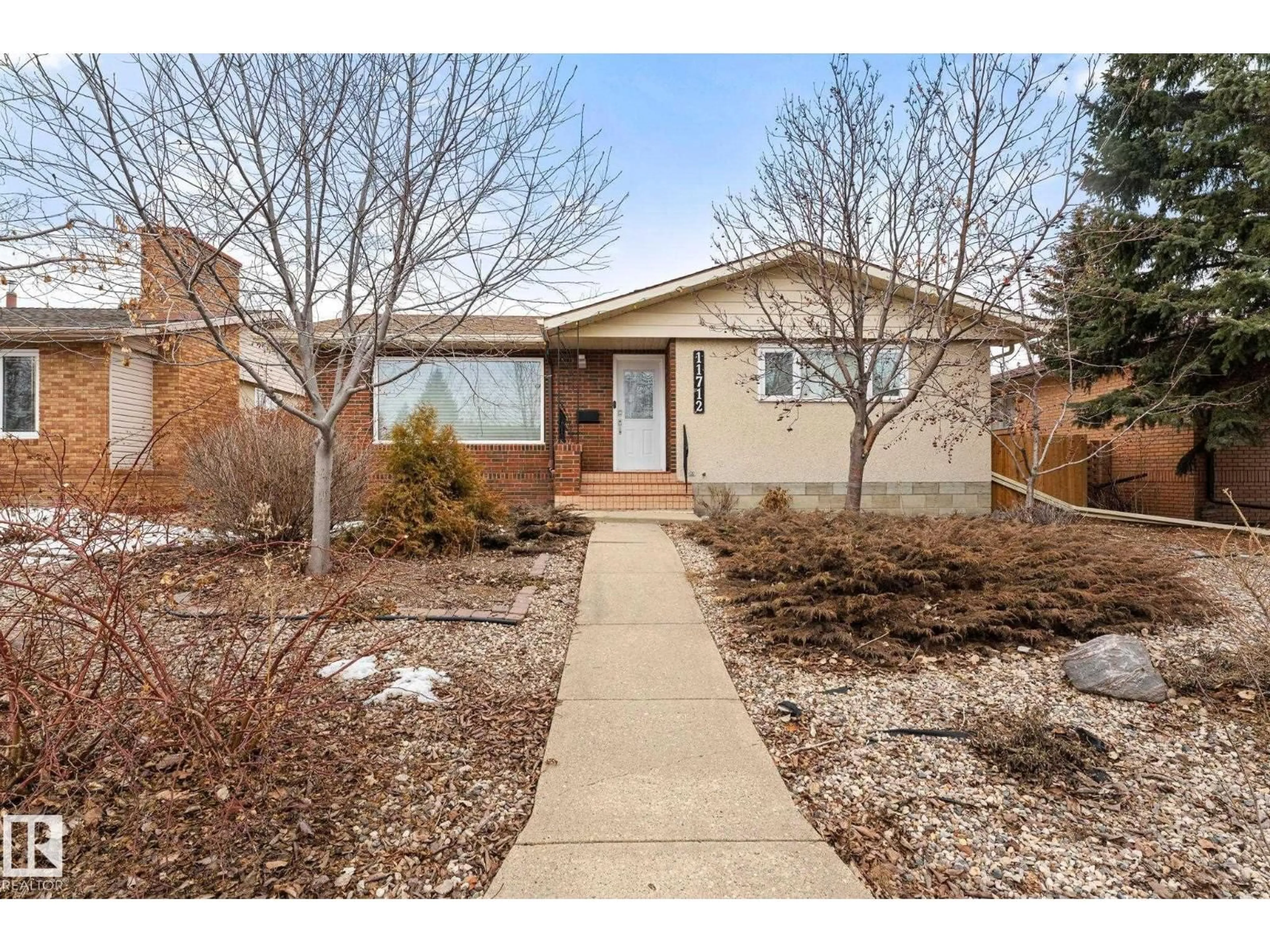 Home with brick exterior material, street for 11712 48 AV, Edmonton Alberta T6H0E6