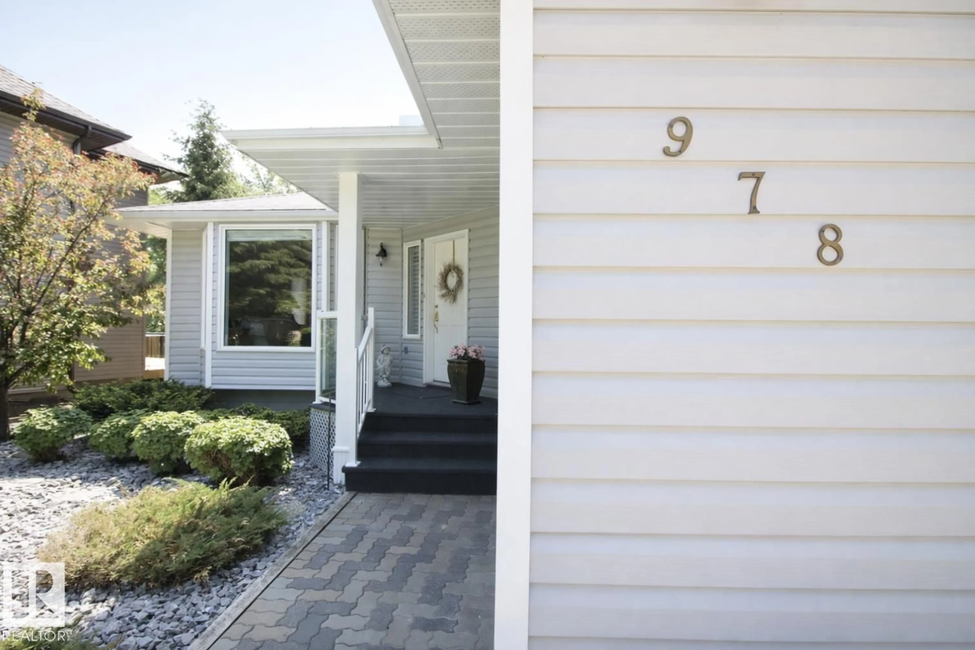 Home with vinyl exterior material, street for 978 9 STREET, Onoway Alberta T0E1A0