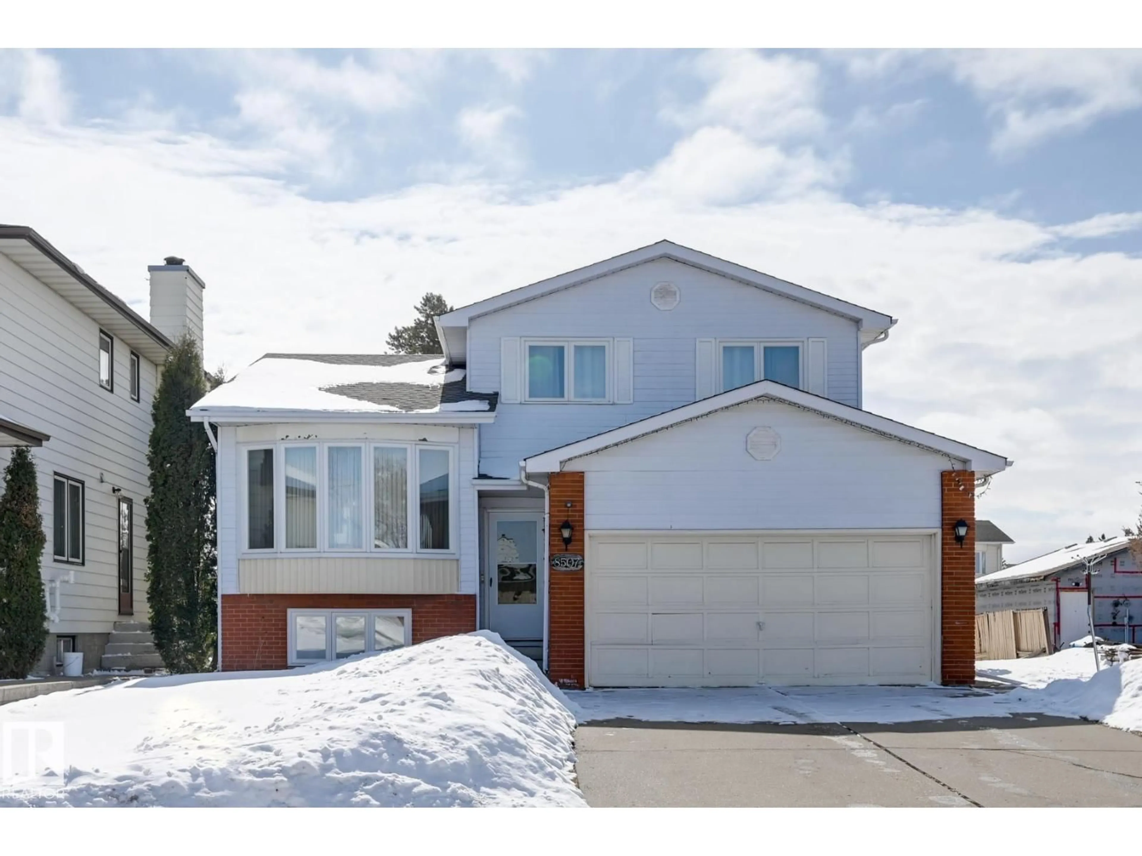 Home with brick exterior material, street for NW - 8507 152B AV, Edmonton Alberta T5E5V7