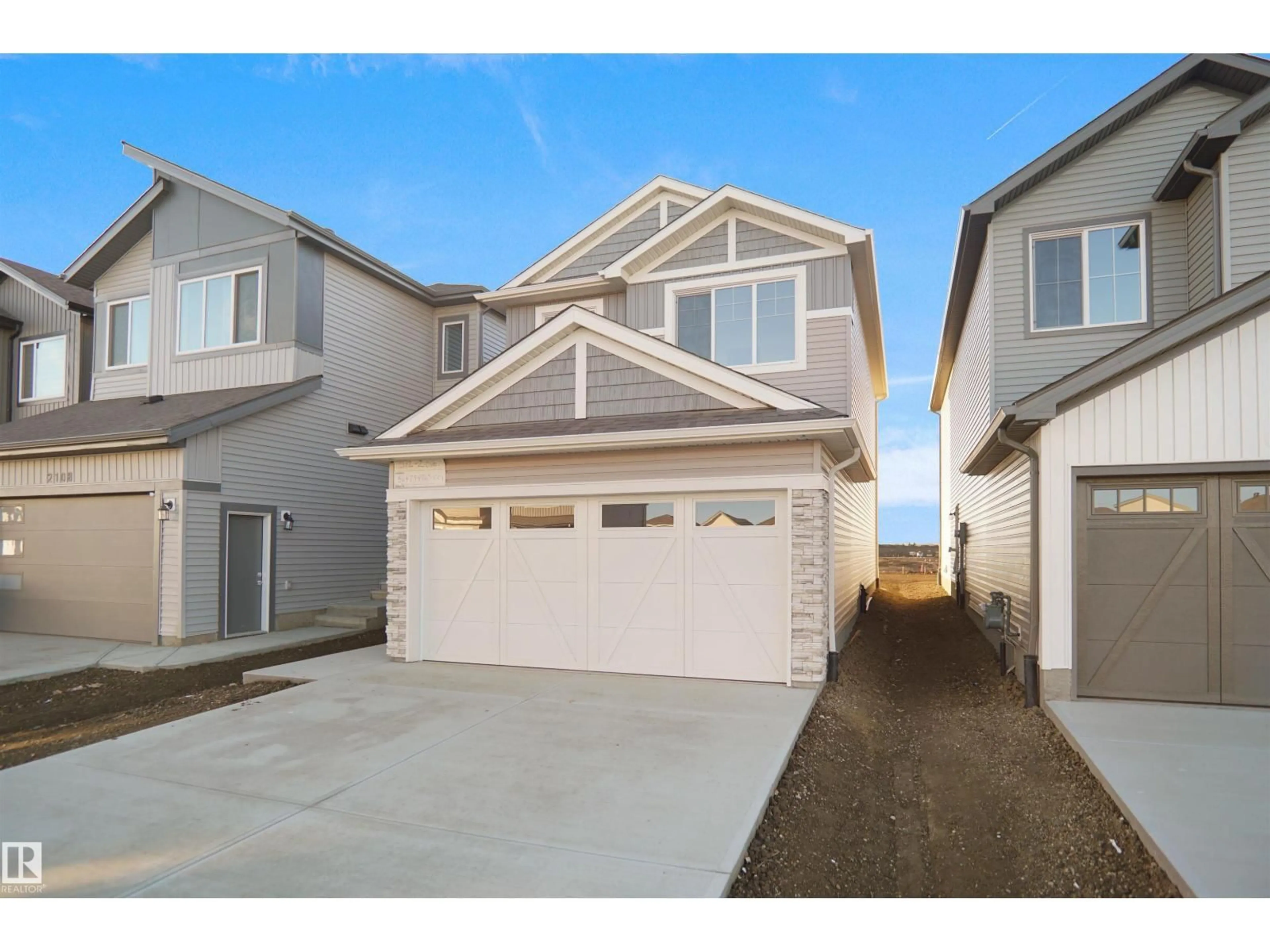 Home with vinyl exterior material, street for 8715 183 AV, Edmonton Alberta T5Z0S8