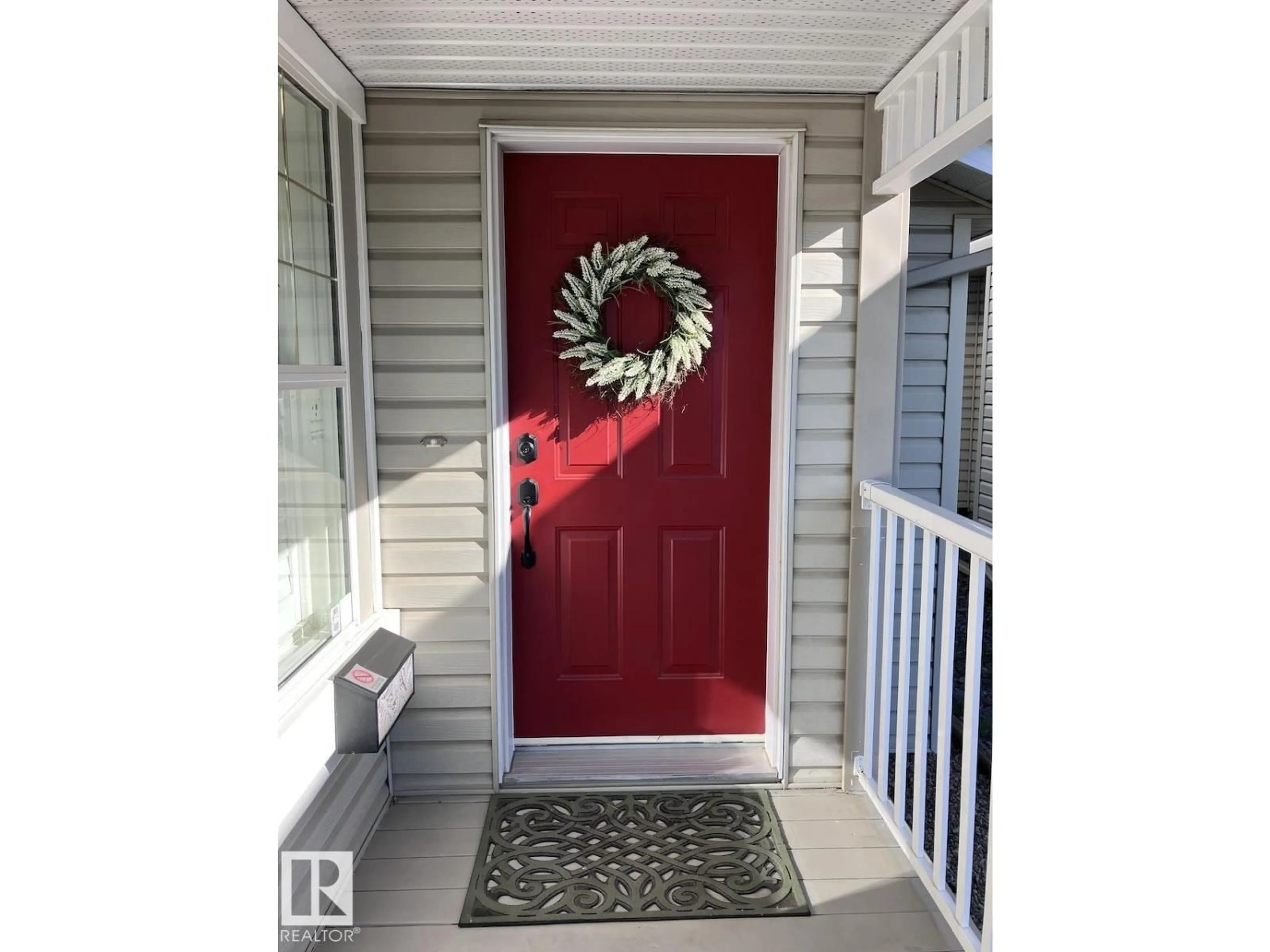 Indoor entryway for 11716 11A AV, Edmonton Alberta T6J7C4