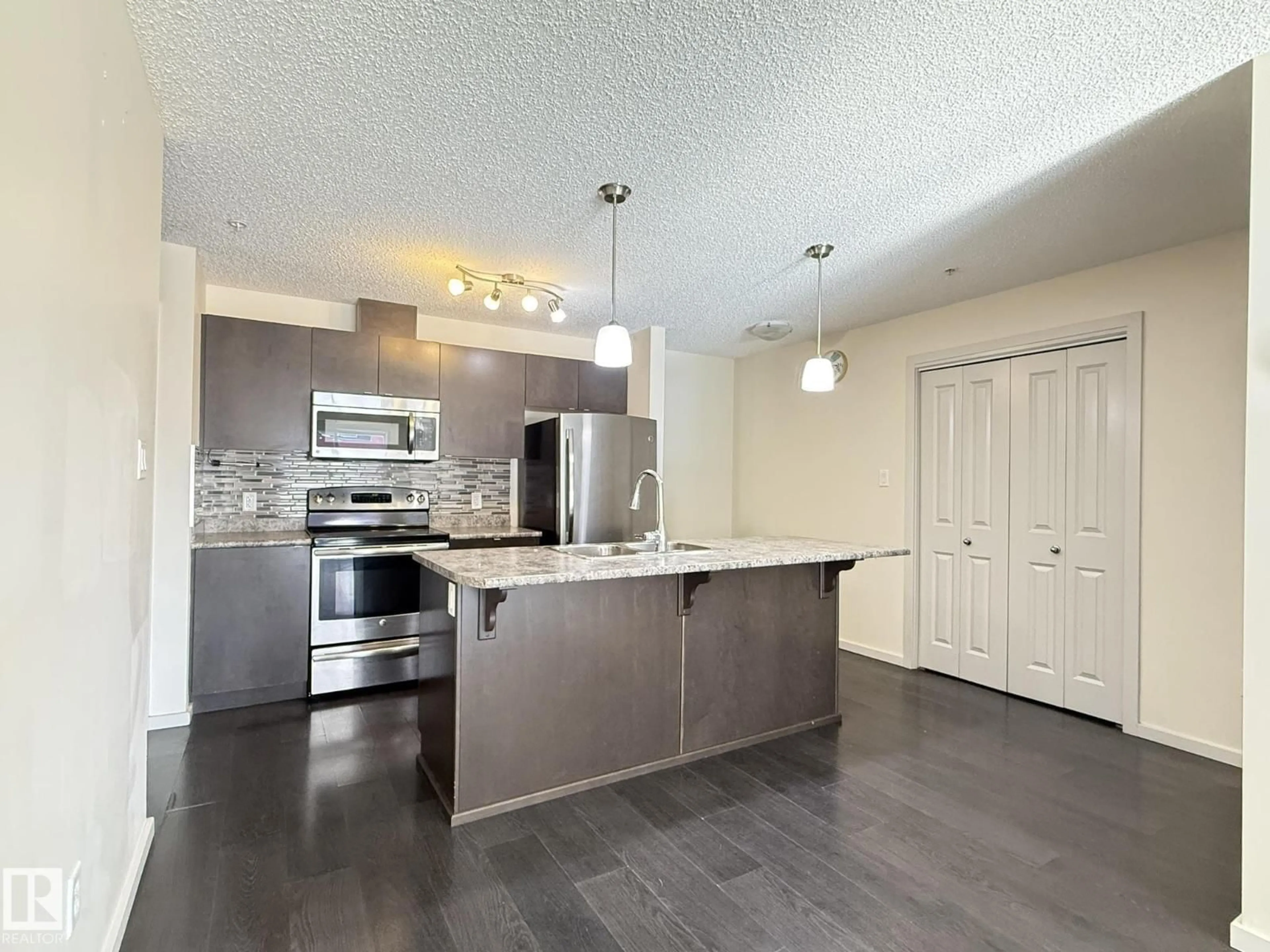 Open concept kitchen, unknown for 344 - 119 WINDERMERE RD, Edmonton Alberta T6W2P2