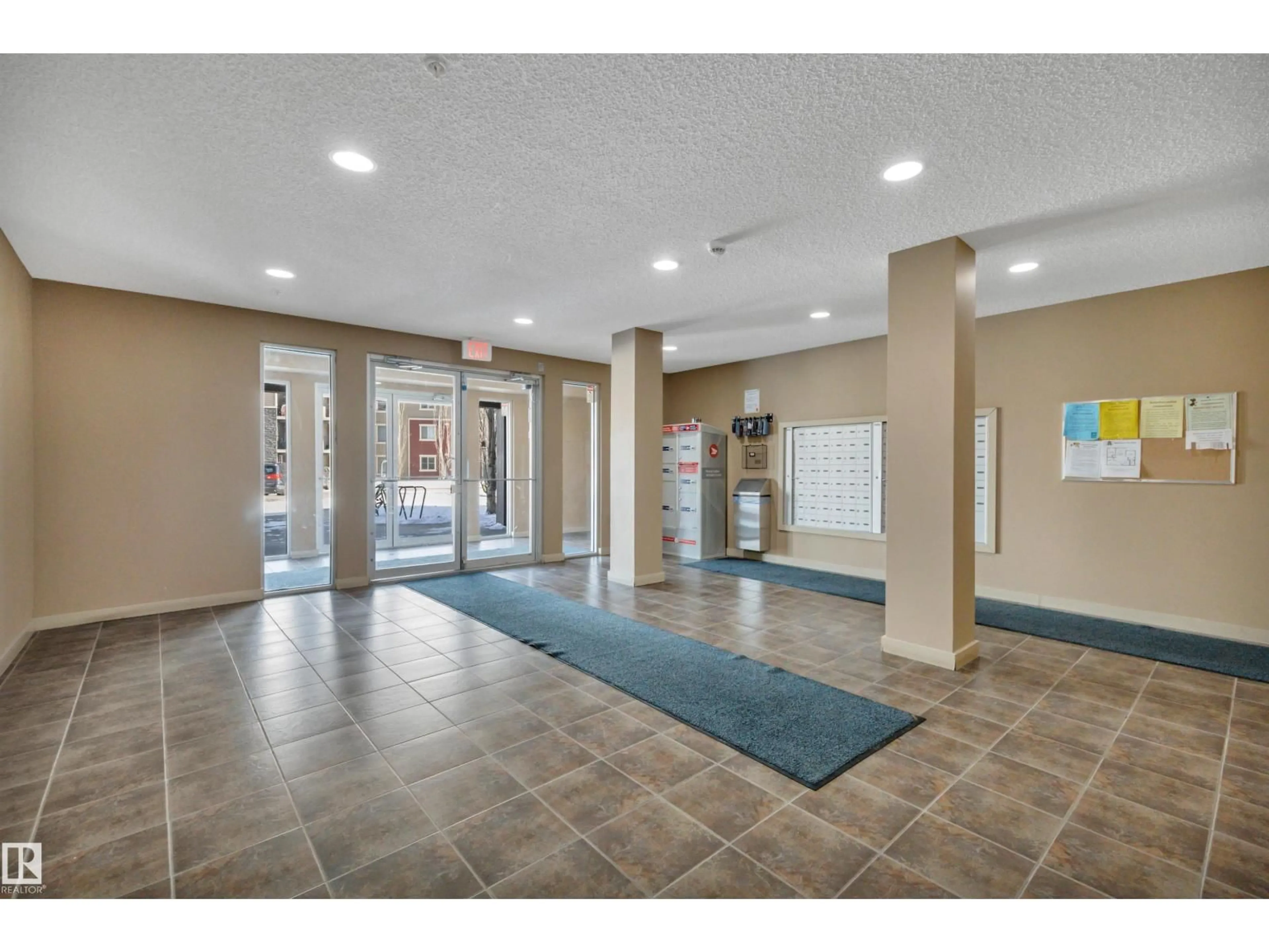 Indoor foyer for #415 - 12035 22 AV, Edmonton Alberta T6W2X9