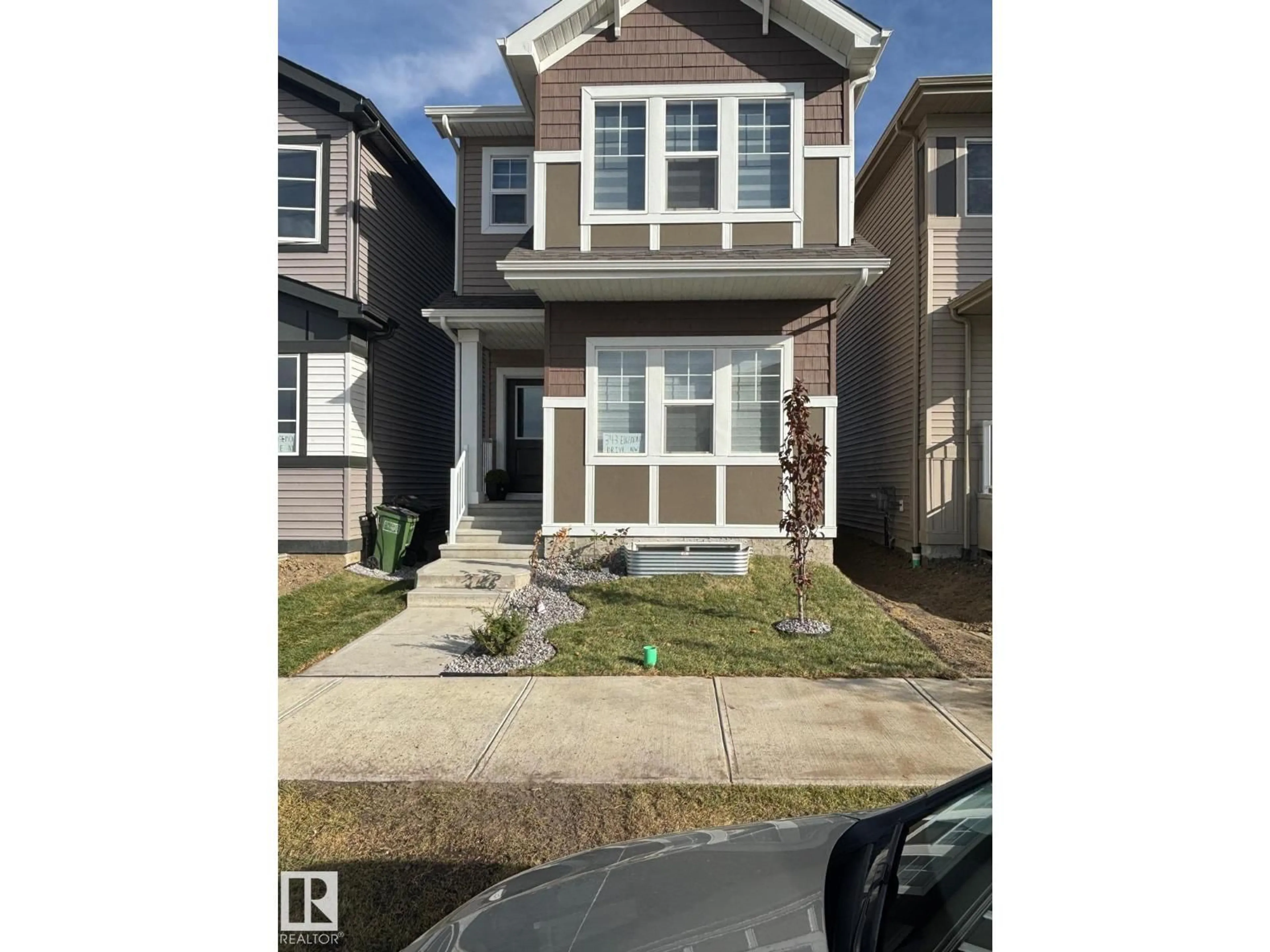 Home with vinyl exterior material, street for 343 EDGEMONT DR, Edmonton Alberta T6M3G7